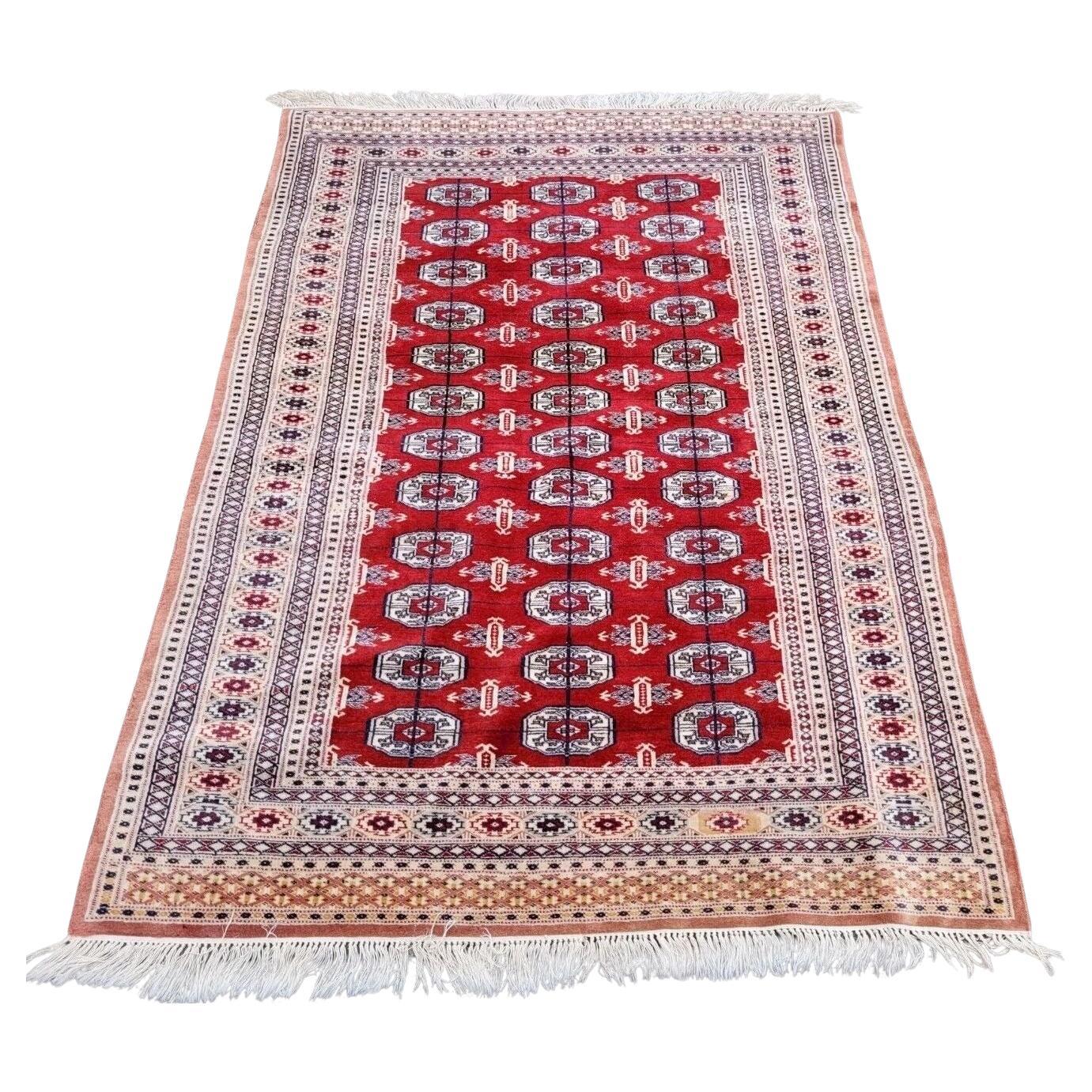 Handgefertigte Vintage Usbek Bukhara Teppich 4,2' x 5,9' 1960er Jahre - 2K22