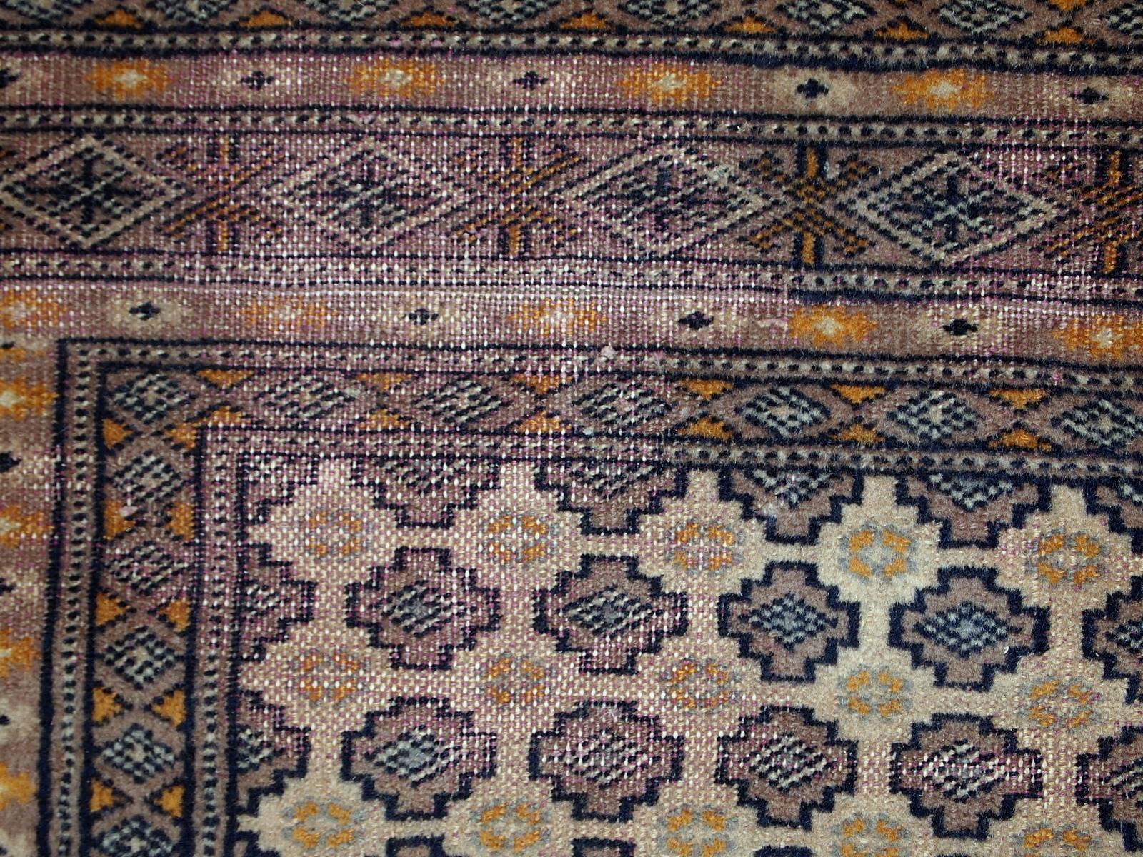 Handmade Vintage Uzbek Bukhara Rug, 1960s In Distressed Condition In Bordeaux, FR