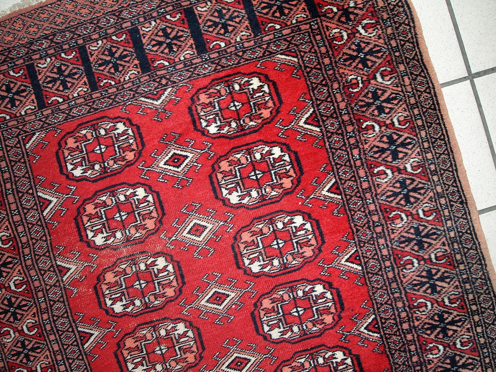 Handmade vintage Uzbek Bukhara runner in original condition, it has some age wear. The rug made in soft wool in the middle of 20th century. 

-condition: original, some signs of age,

-circa: 1960s,

-size: 2.7' x 9' (83cm x 275cm),

-material: