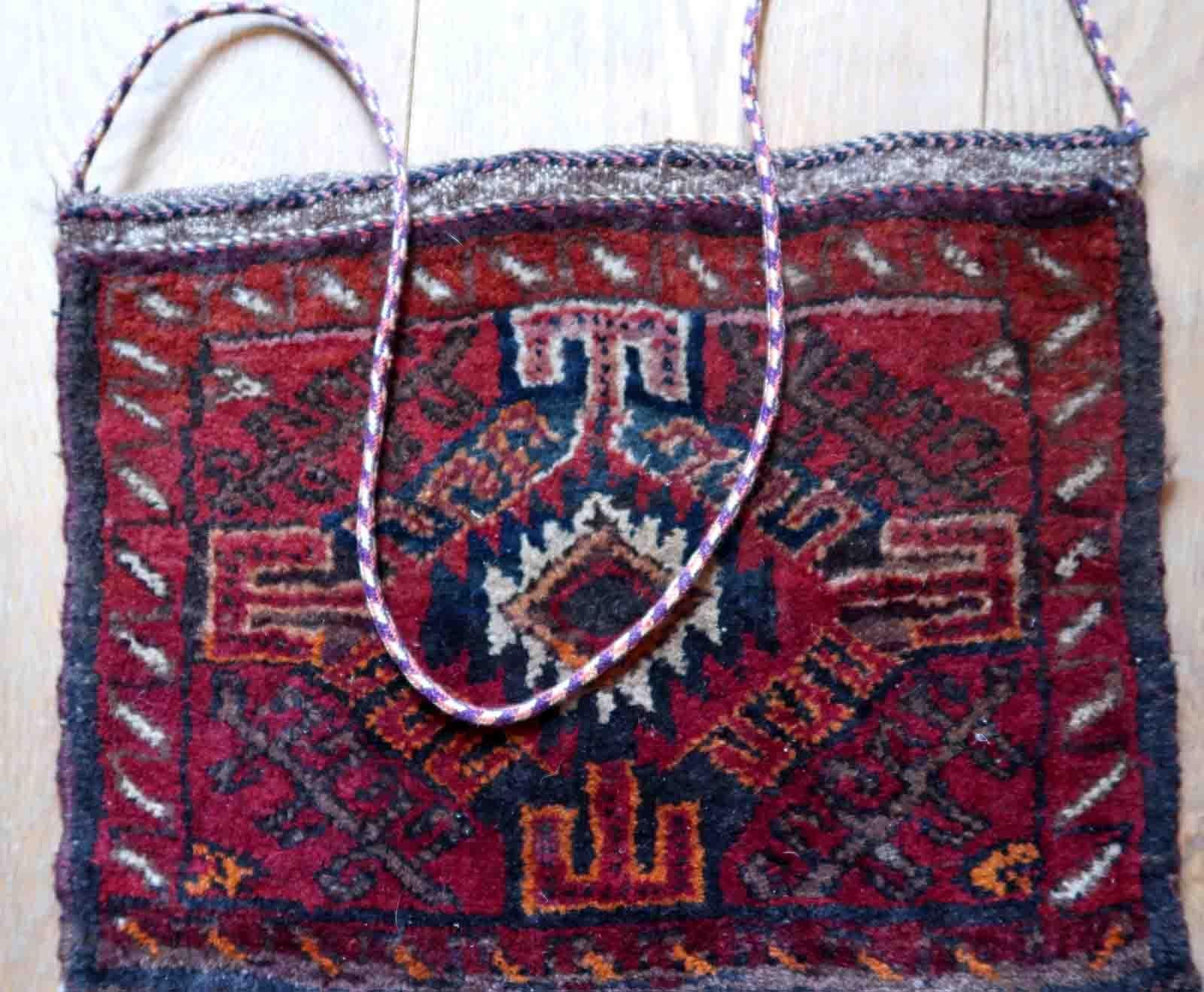 Handmade vintage Uzbek Salt bag in red color and large medallion. The bag is from the end of 20th century in original good condition. The handle has been attached to it, it can be removed or used as a regular handbag.

-condition: original
