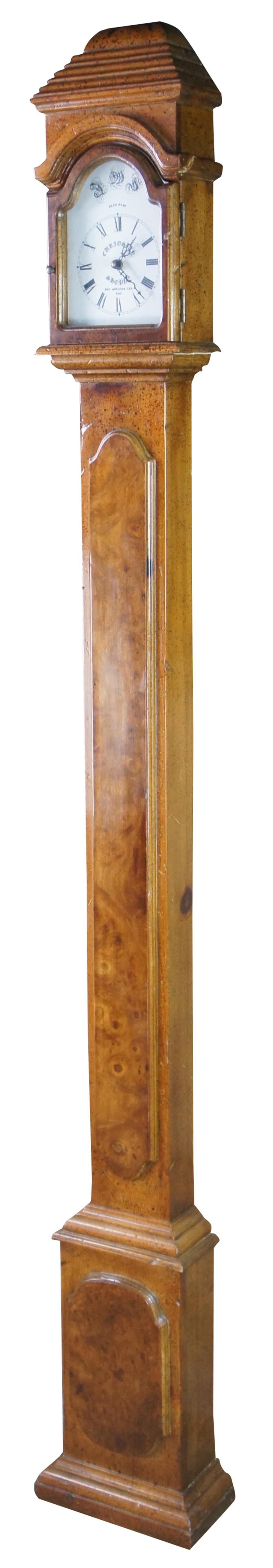 Vintage hand made tall case Grandmother clock from the Curiosity Shoppe of Hot Springs Arkansas. Made from distressed pine with walnut burl paneling. Features a slim, quartz movement and roman numeral face. Measure: 81