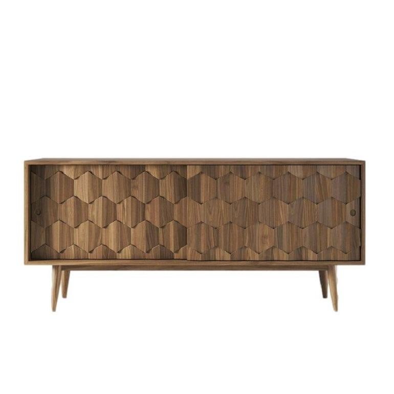 Constructed from premium certified materials, this sideboard highlights traditional joinery techniques.
The rectangular design of the sideboard incorporates a structure and interiors made entirely from 100% solid wood. It features a distinctive