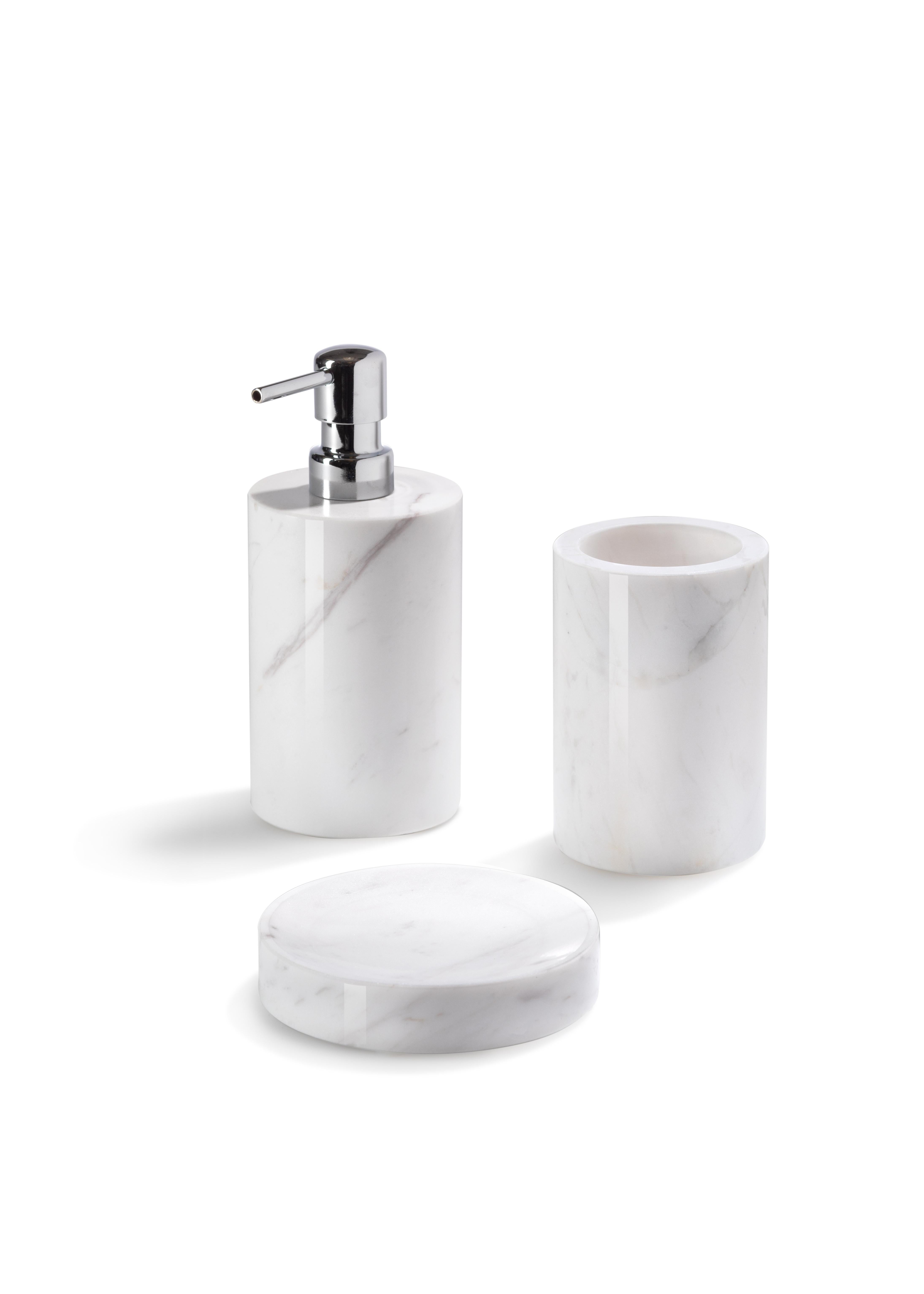 Crafted from elegant white marble, this deluxe bathroom set is designed to enhance both the beauty and functionality of your bathroom, spa, or hotel.

The set includes a round tray, soap dispenser, soap dish, toothbrush holder. All four pieces are