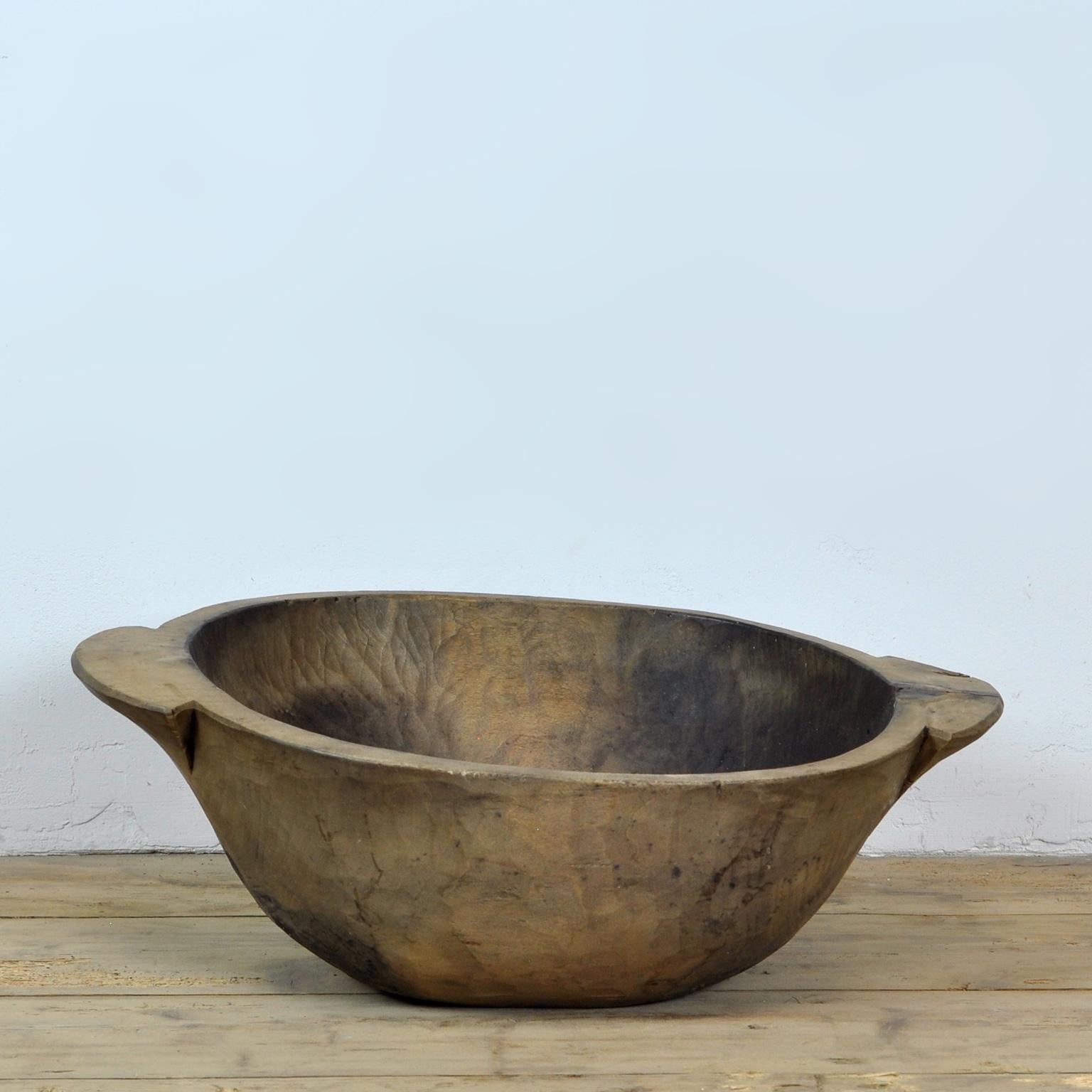 Beautiful hand carved Hungarian dough bowl, circa 1920s. Made of fruitwood.