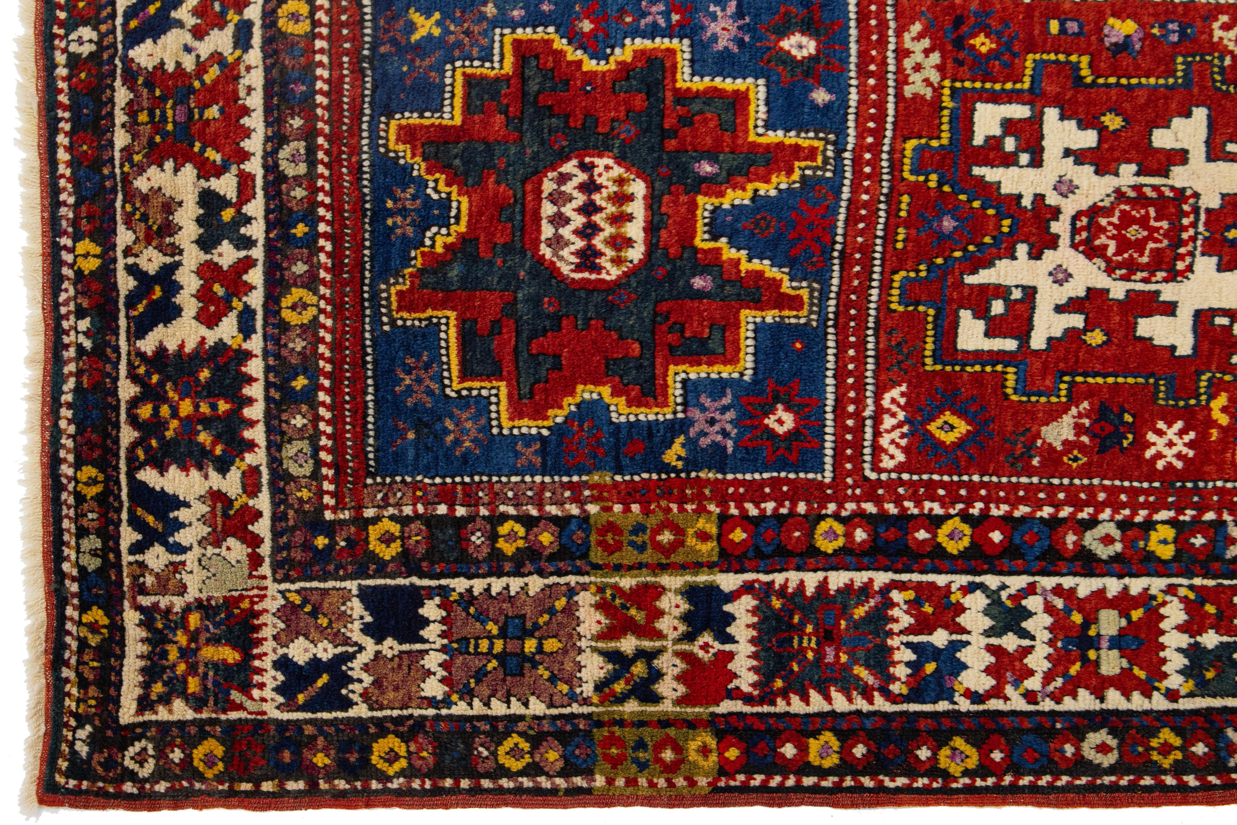 Early 20th Century Handmade Wool Antique Runner Caucasian Kazak With Multicolor Design For Sale