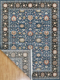 Handmade Wool Rug in Orion Blue Liquorice Black Border & Floral Persian Design