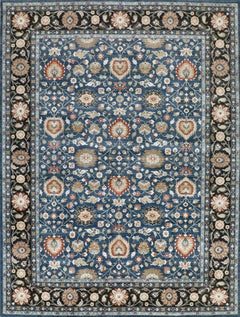 Handmade Wool Rug in Orion Blue Liquorice Black Border & Floral Persian Design