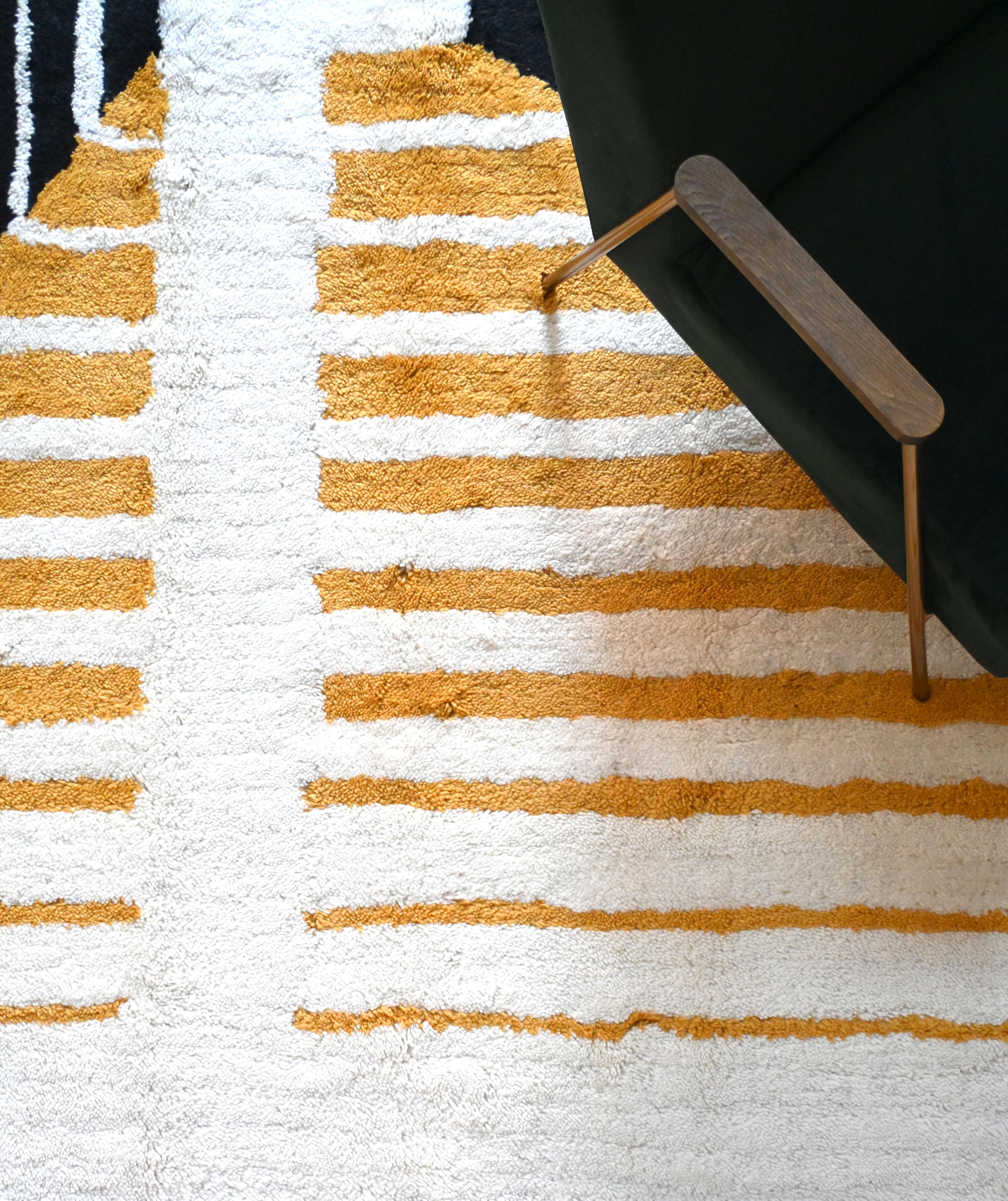 Discover the Infinity rug, an exclusive design inspired by the iconic Bauhaus white, black & yellow poster. Handcrafted with high-quality materials, this rug combines modernist aesthetics with the durability and softness of the finest fibers.