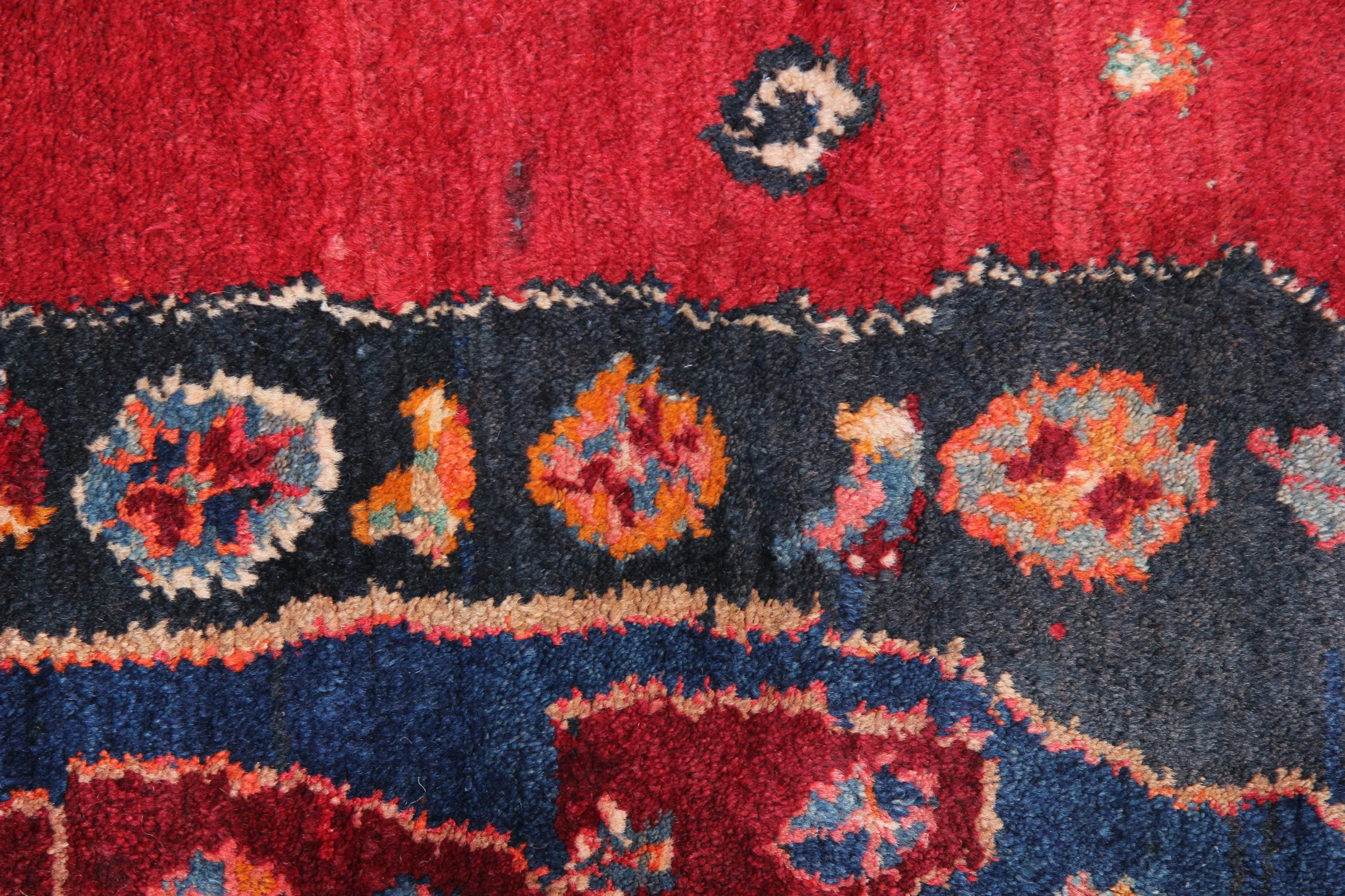 Are you looking for a vintage piece to uplift your space? Then Look no further! Both the colour, design and construction of this fine wool rug make it the perfect accent piece. This piece features a rich red all over tribal design woven on a