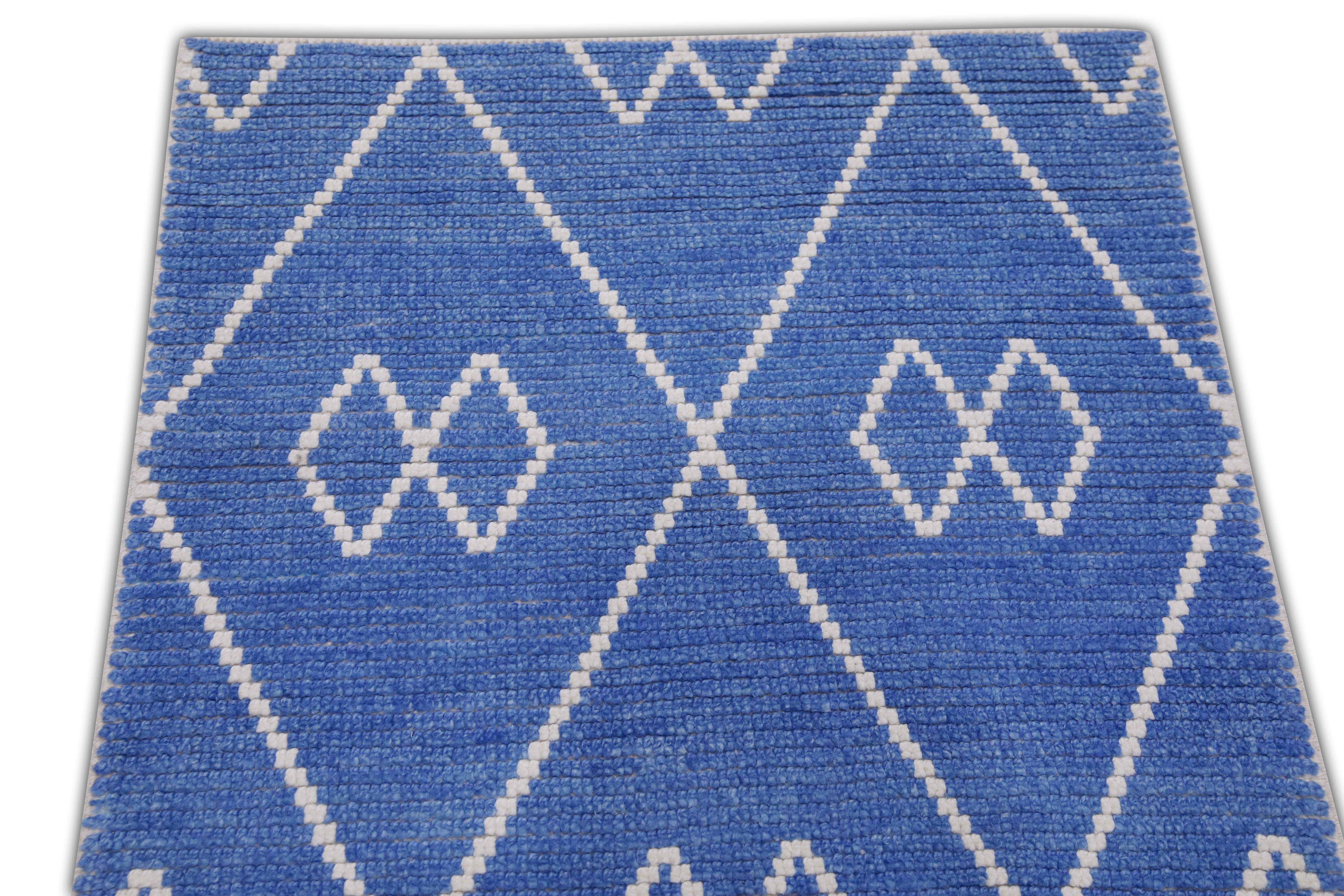 Handgefertigter Tulu-Teppich aus Wolle in geometrischem Design 2'8