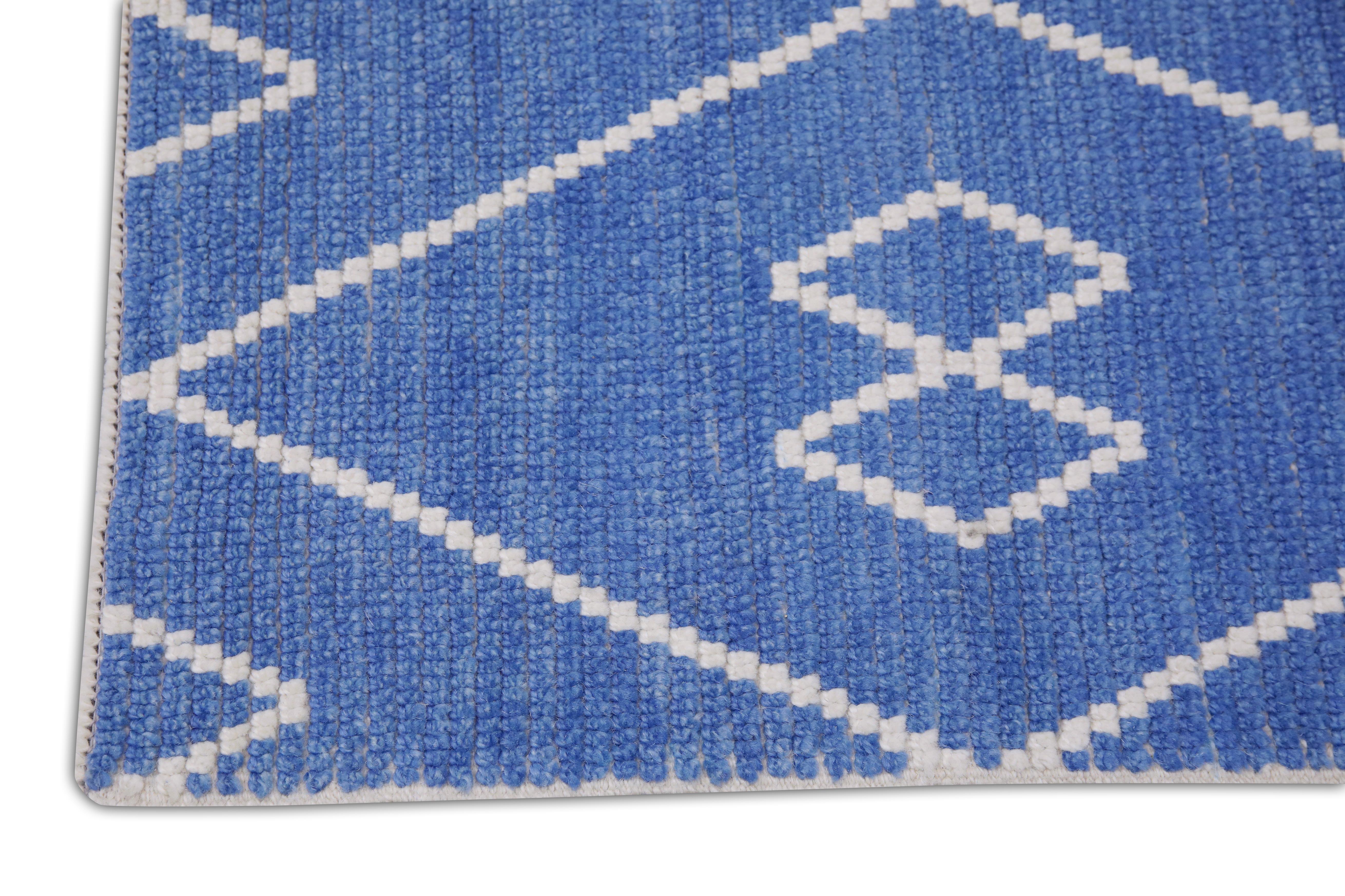Handgefertigter Tulu-Teppich aus Wolle in geometrischem Design 2'8