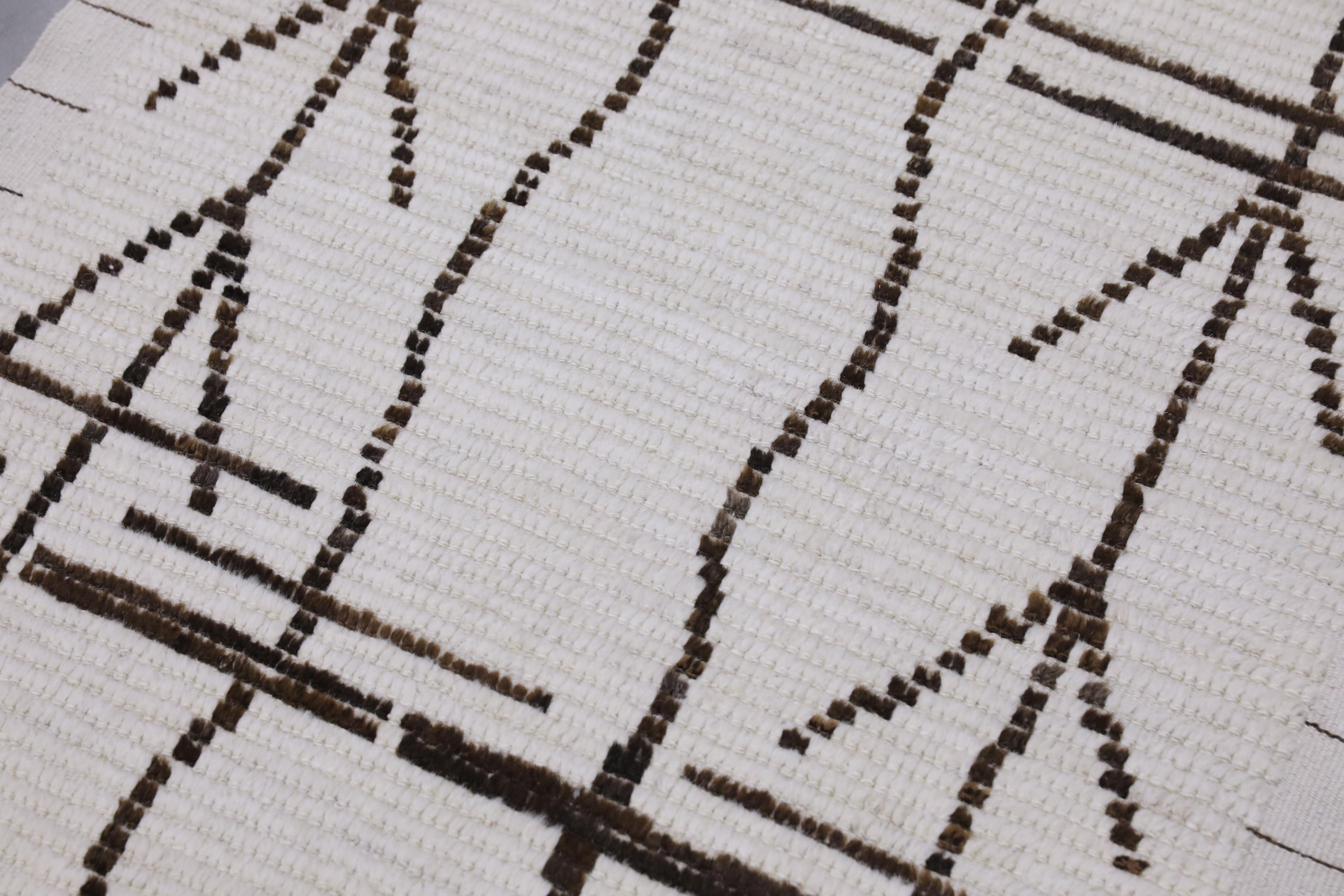 Tappeto Tulu in lana fatto a mano con design geometrico 2'9
