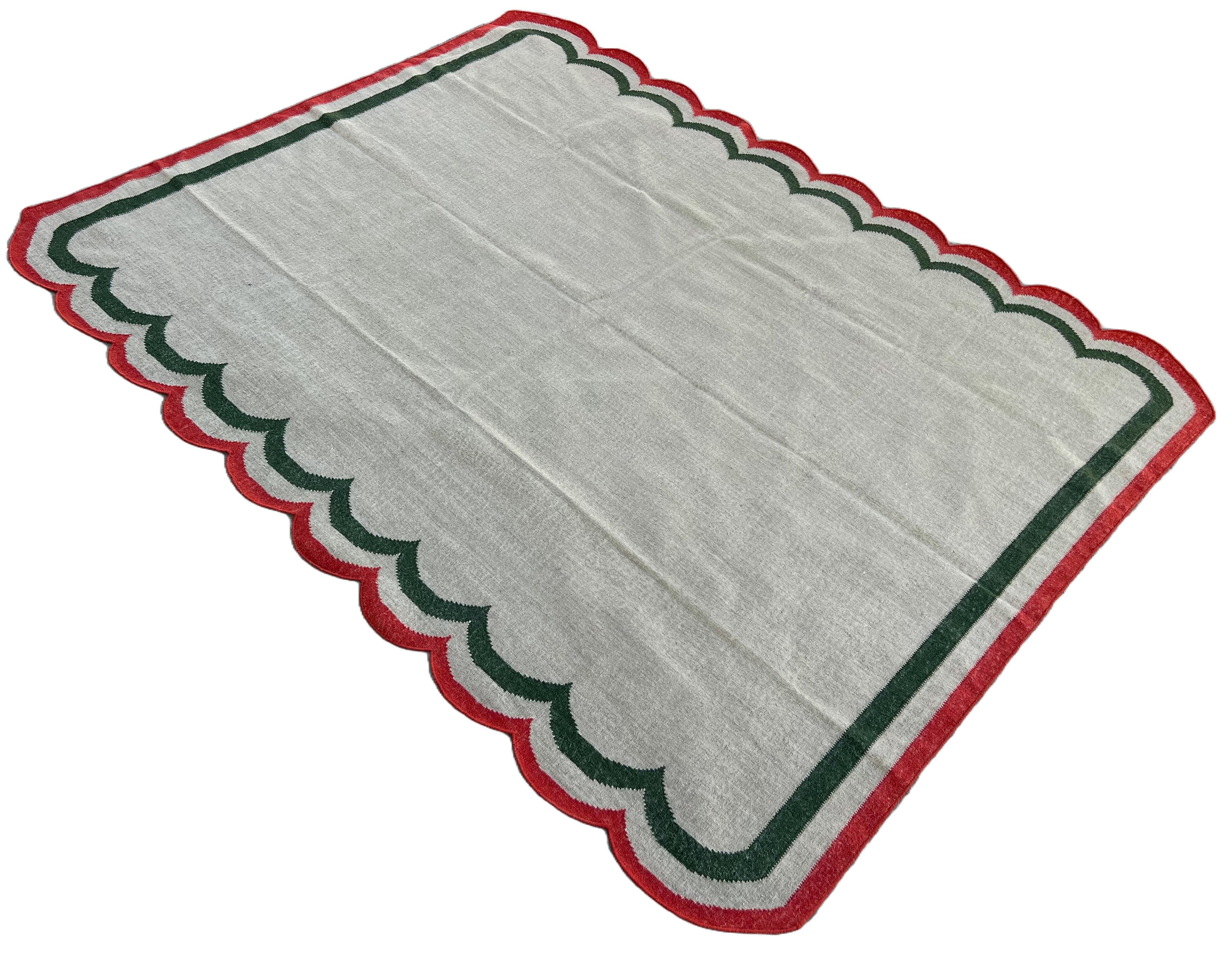 Handmade New Zealand Wool Vegetable Dyed Beige, Dark Sage Green And Coral Red Scalloped Striped Indian Dhurrie Rug- 8'x10' (240x300cm) 
Scallops runs on 10' sides.

These special flat-weave dhurries are hand-woven with 15 ply 100% cotton yarn. Due