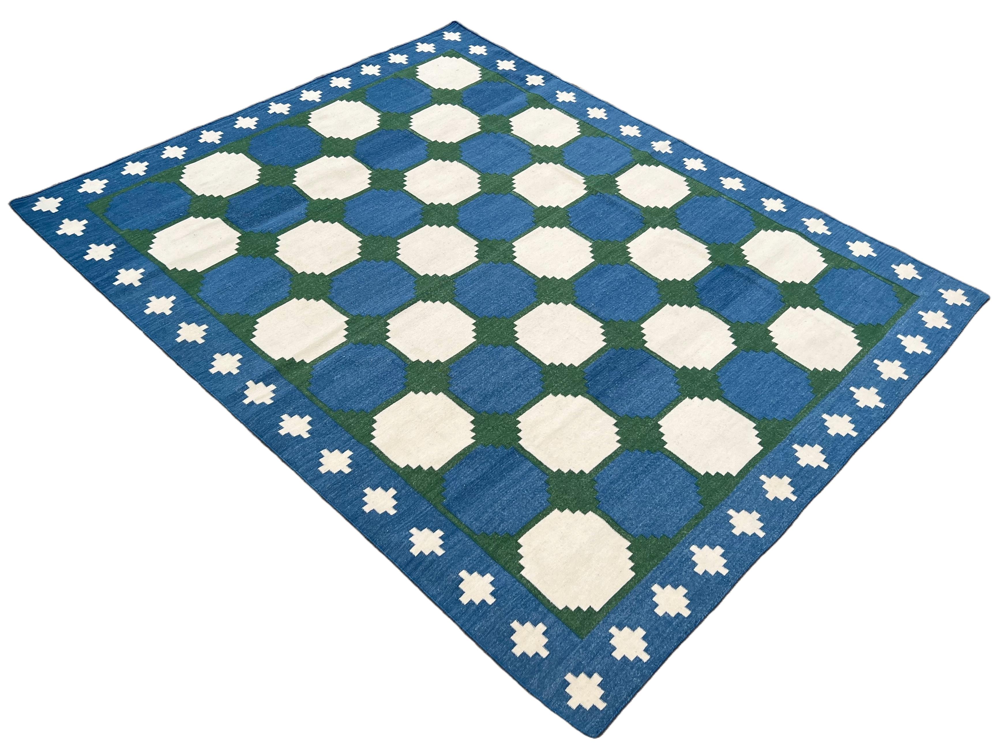 Handmade New Zealand Wool Vegetable Dyed Blue, Cream And Green Tile Patterned Indian Rug - 8'x10'
These special flat-weave dhurries are hand-woven with 15 ply 100% cotton yarn. Due to the special manufacturing techniques used to create our rugs, the