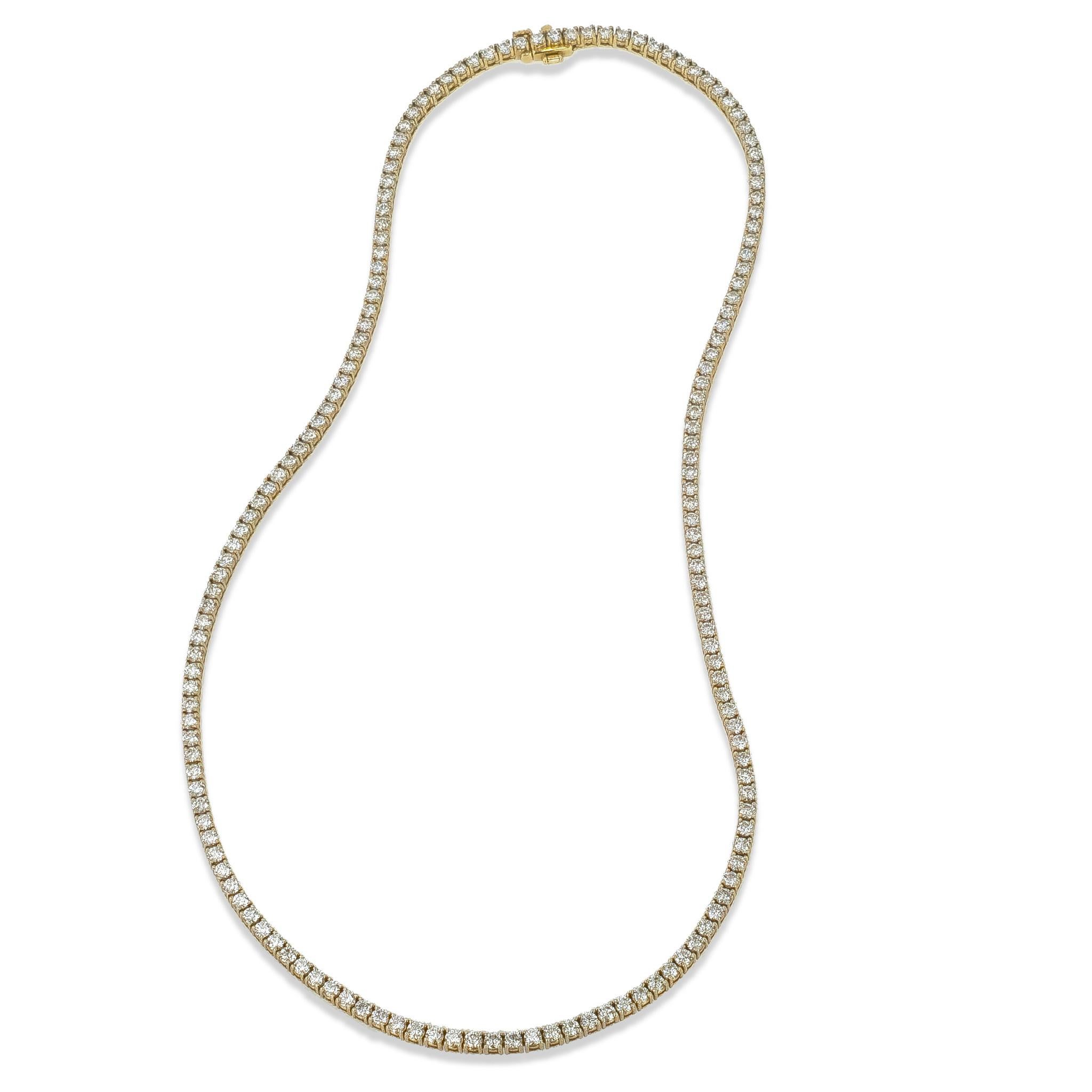 This stunning 18 karat yellow gold tennis necklace from the handmade H & H Jewels collection is adorned with 9.01 carat total weight of exquisitely cut F/G VS1 (EX,EX) diamonds, each weighing 0.057ct. 

At 17