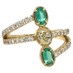 Handmade Yellow, White Diamonds and Emerald Trendy ring.