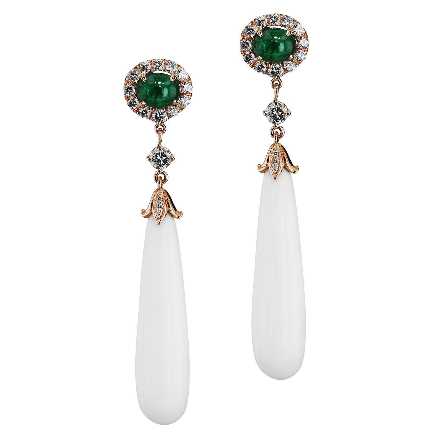 Crafted with love, these 18 karat rose gold Zambian Emerald White Agate Drop Earrings exude magnificence. Showcasing two emeralds, white Agate and brilliant cut diamonds pave. These earrings will make a stunning statement.

Zambian Emerald Agate