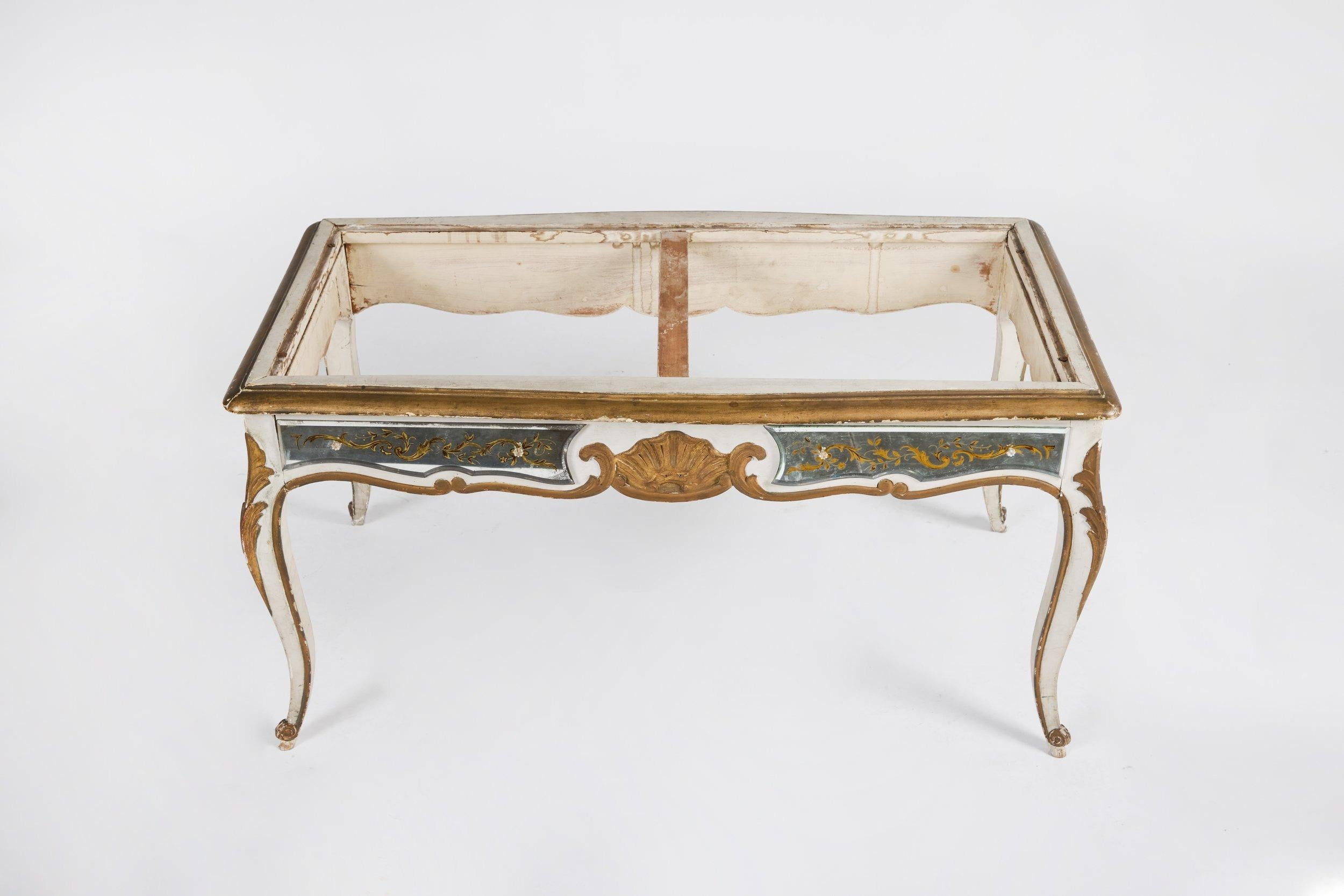 Antique handpainted table with fleur mirror motif.  Note: glass tabletop needs to be replaced, one panel cracked 