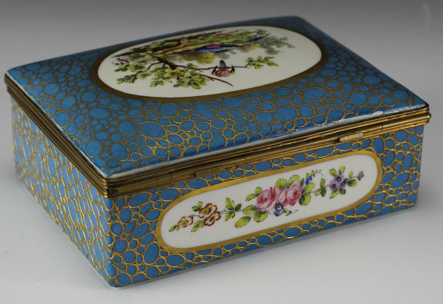 Handpainted Porcelain and Gilt Bronze Jewelry box sevres - Features Pheasant

Features Pheasant in landscape, floral sprays, raised gold gilt designs.

Additional Information:
Primary Material: Porcelain 
Original/Reproduction: Original
Type: