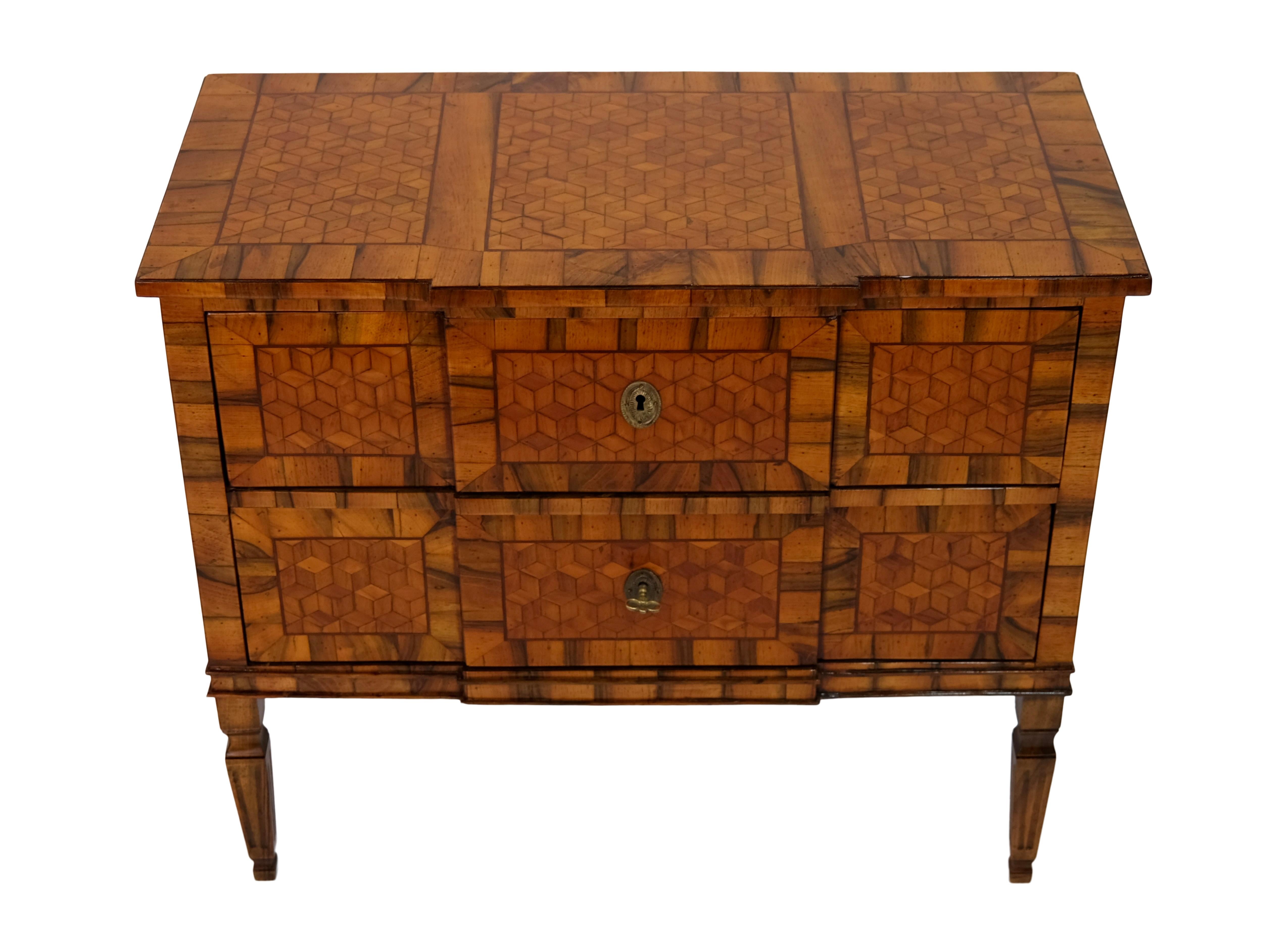 Chest of drawers with two drawers. 
Nut-wood, shellac hand polished

In the style of Louis XVI (also: Louis-seize), 
France around 1830. 

Dimensions:
Width: 85 cm
height: 73 cm
Depth: 41 cm.