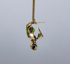"Hands" Earrings by Binliang Alexander Peng, Peridots and 18k Gold