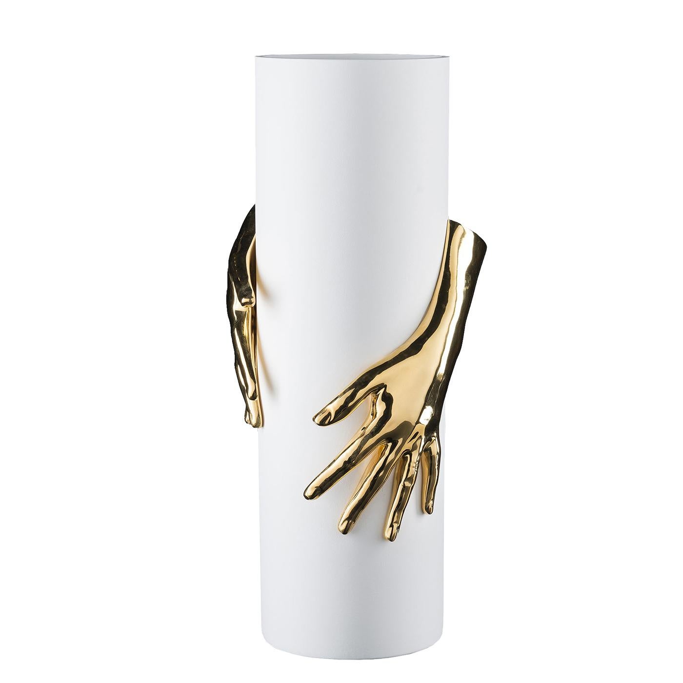 Masterfully handcrafted, this highly decorative vase will make a statement in any decor, infusing it with refined sophistication. A celebration of Italian craftsmanship, it is fashioned of white ceramic and boasts a splendid low relief depicting two