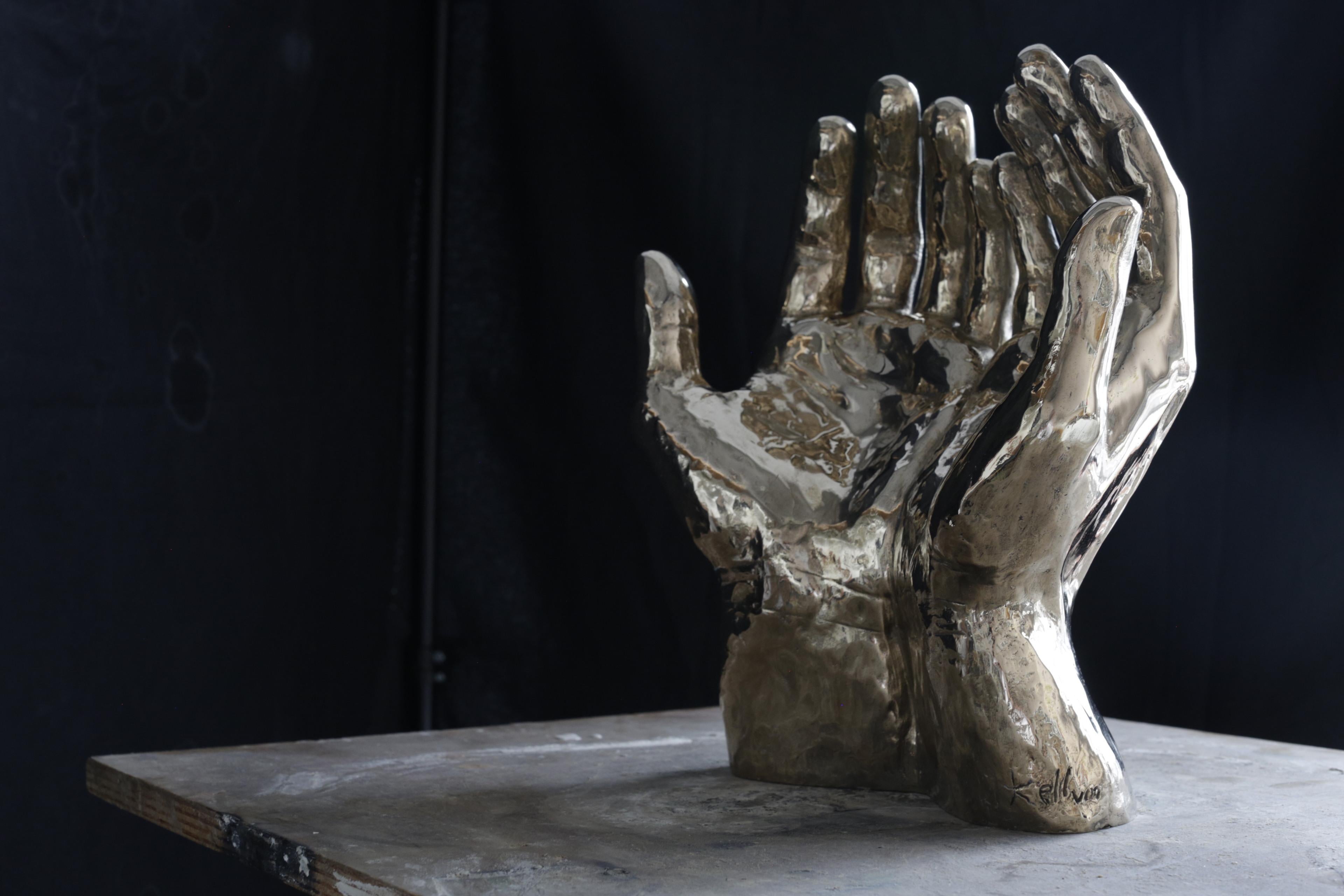 bronze hand sculpture