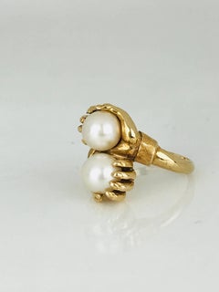 Hands Holding Pearls, Yellow Gold Contemporary