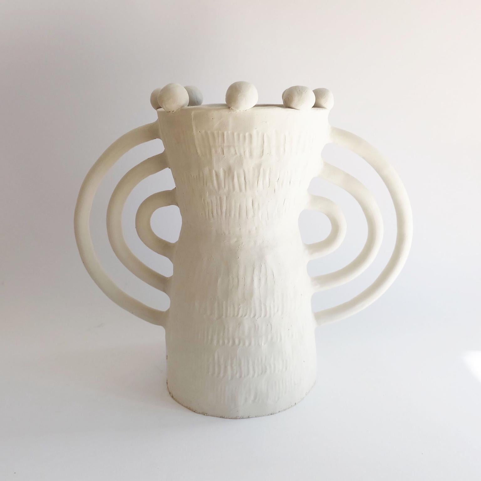 Handsculped Alcazar table lamp by Ia Kutateladze
Dimensions: W 32 x H 26 cm
Materials: Raw white clay

Alcazar lamp combines hand-built organic structure, with soft geometric elements and shapes, an object full of character.

IAAI / Ia