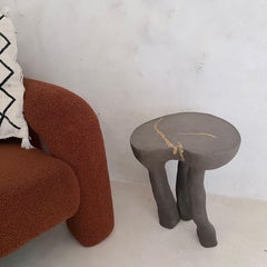 Handsculptured ceramic table organic kintsugi style by Studio Wild Orange