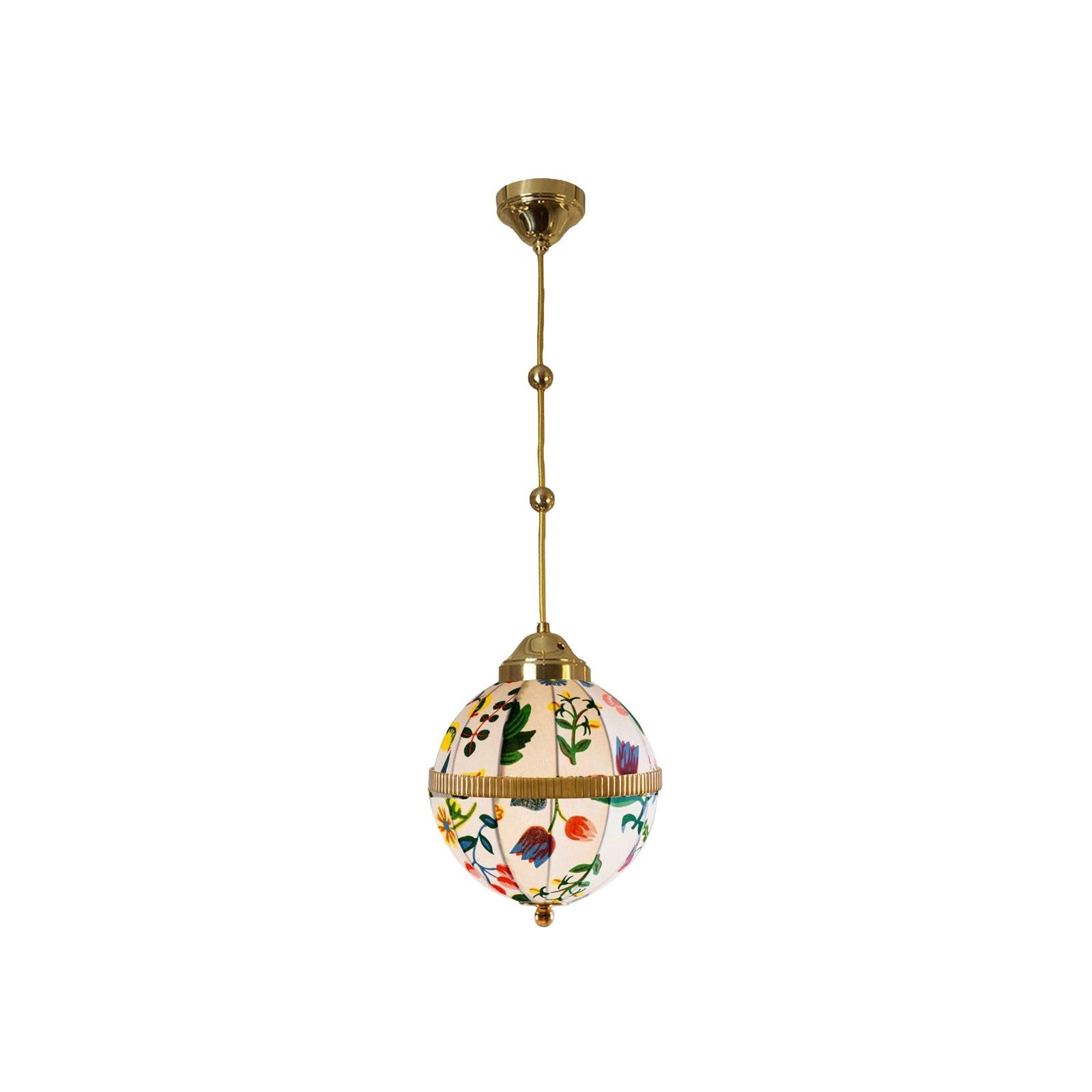 Handsewn fabric shade, pattern by Josef Frank for Svenskt Tenn, hanging on a fabric-covered wire, brass-parts in the requested finish

Height is customisable