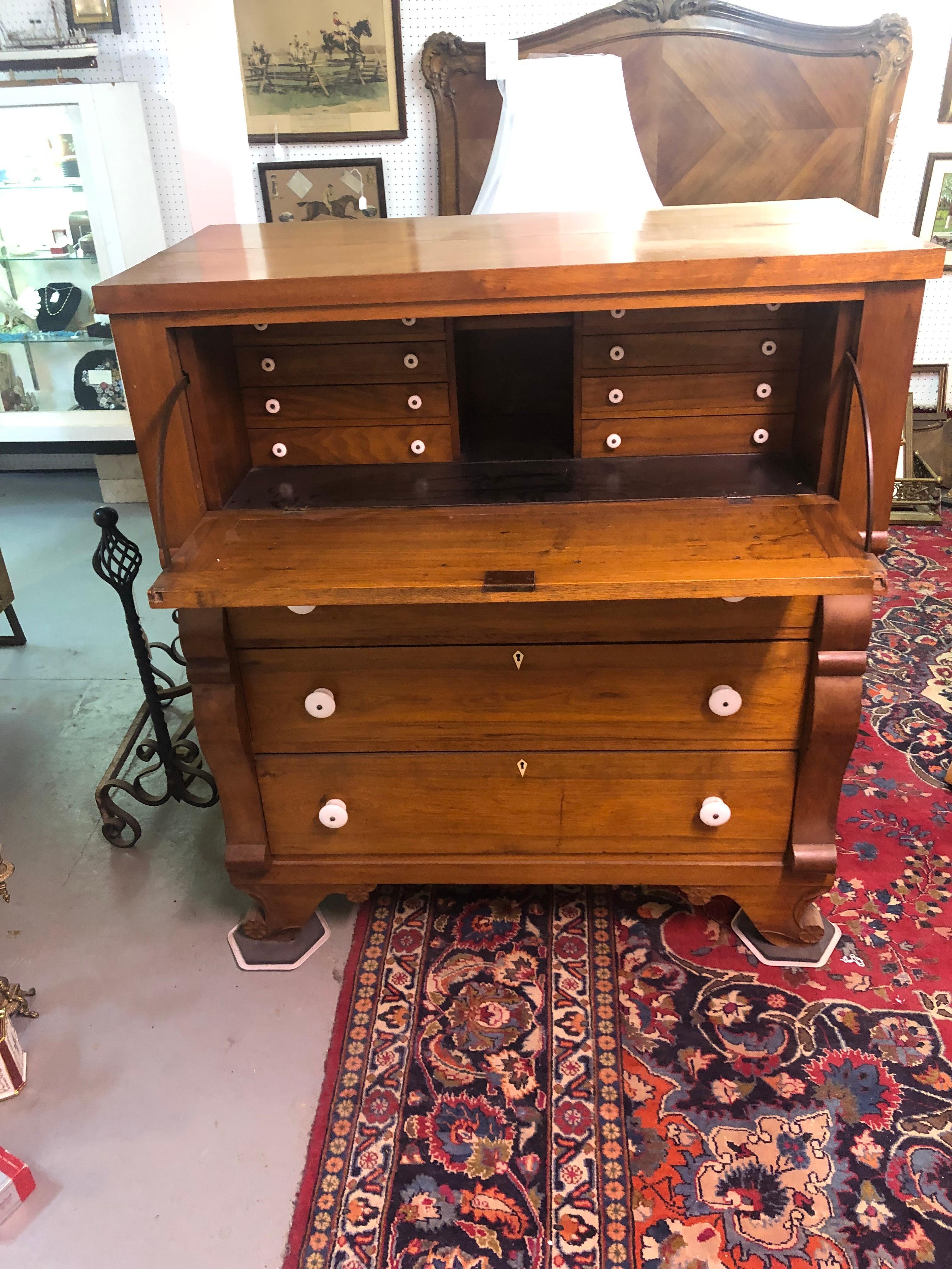 Handsome 19th century butler's secretary signed and dated by Ja. B. Metz, Norrisville PA 1880. Made in the master craftsman tradition having hand cut dovetail joinery, bone escutcheons, original porcelain knobs, pull down desk with 8 little drawers,