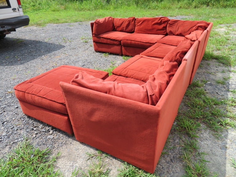 Handsome 7-piece Milo Baughman style sectional sofa from the midcentury. This set will need to be reupholstered as the original fabric is worn and dated. This sofa measures 28
