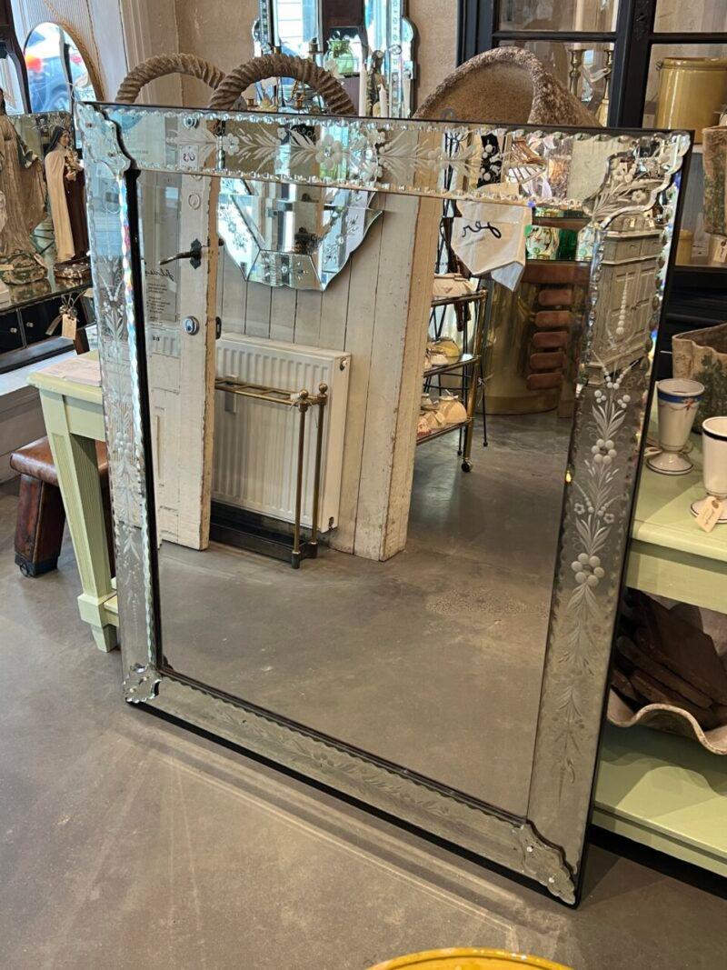 Handsome and impressive almost square Venetian mirror from circa 1940s France.

They have often hung in distinguished halls of old French chateaux and stately homes, hanging opposite the windows, in order to reflect the daylight and give a larger