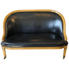 Handsome and Sleek Fruitwood and Faux Black Leather Loveseat