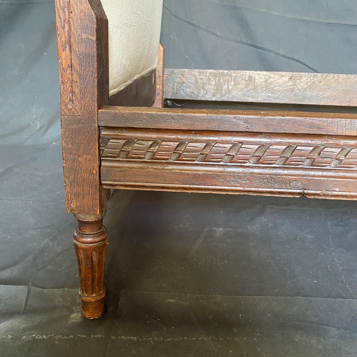 English Handsome Antique Newly Upholstered Highly Carved Elizabethan Daybed   For Sale
