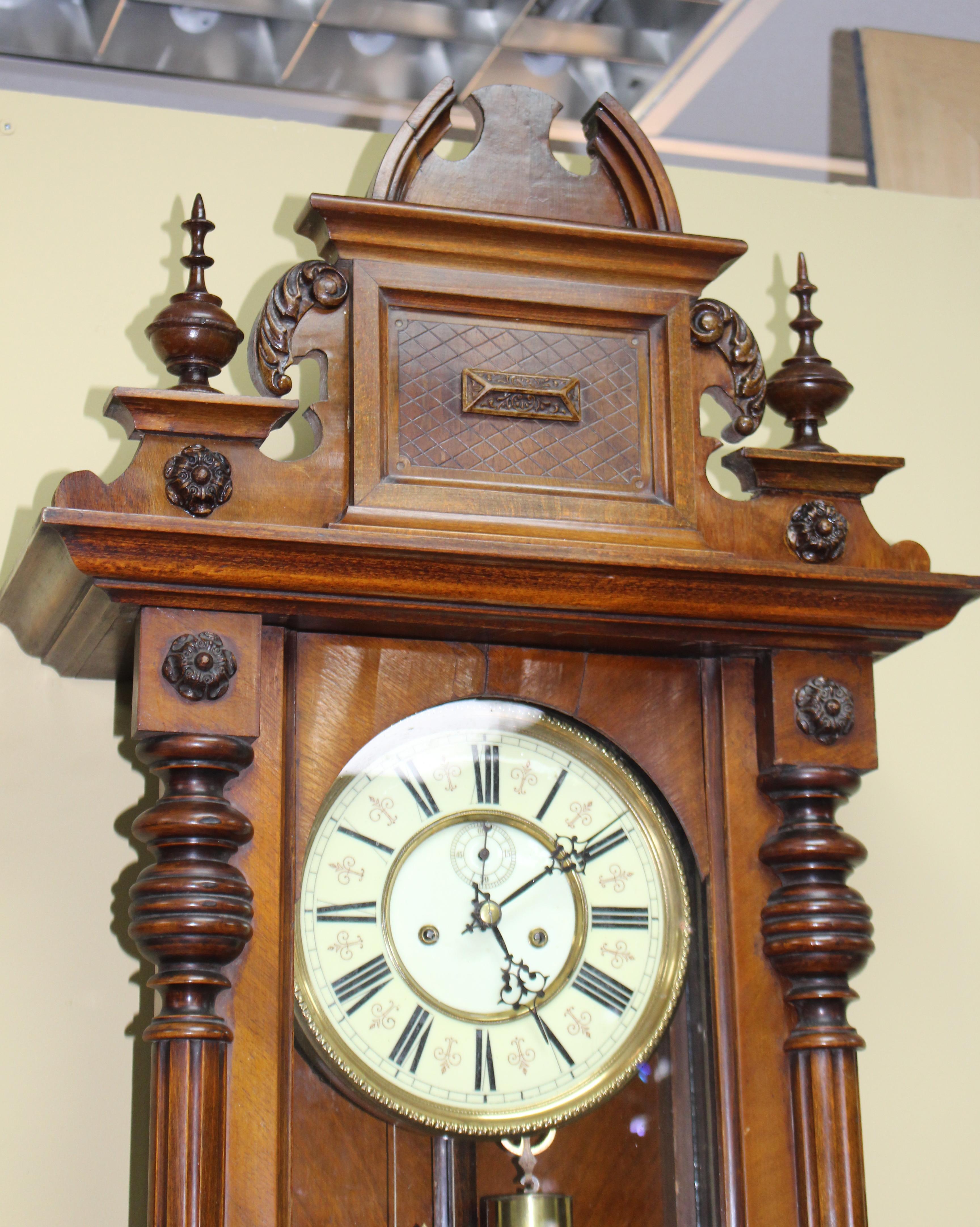 Type Vienna wall clock
Period Victorian
Movement Working double weighted Vienna, 8 day movement, gong strike on the hour and half-hour. Maker Friedrich Mauthe, Schwenningen
Case walnut, carved decoration
Dial brass and enamel dial, Roman