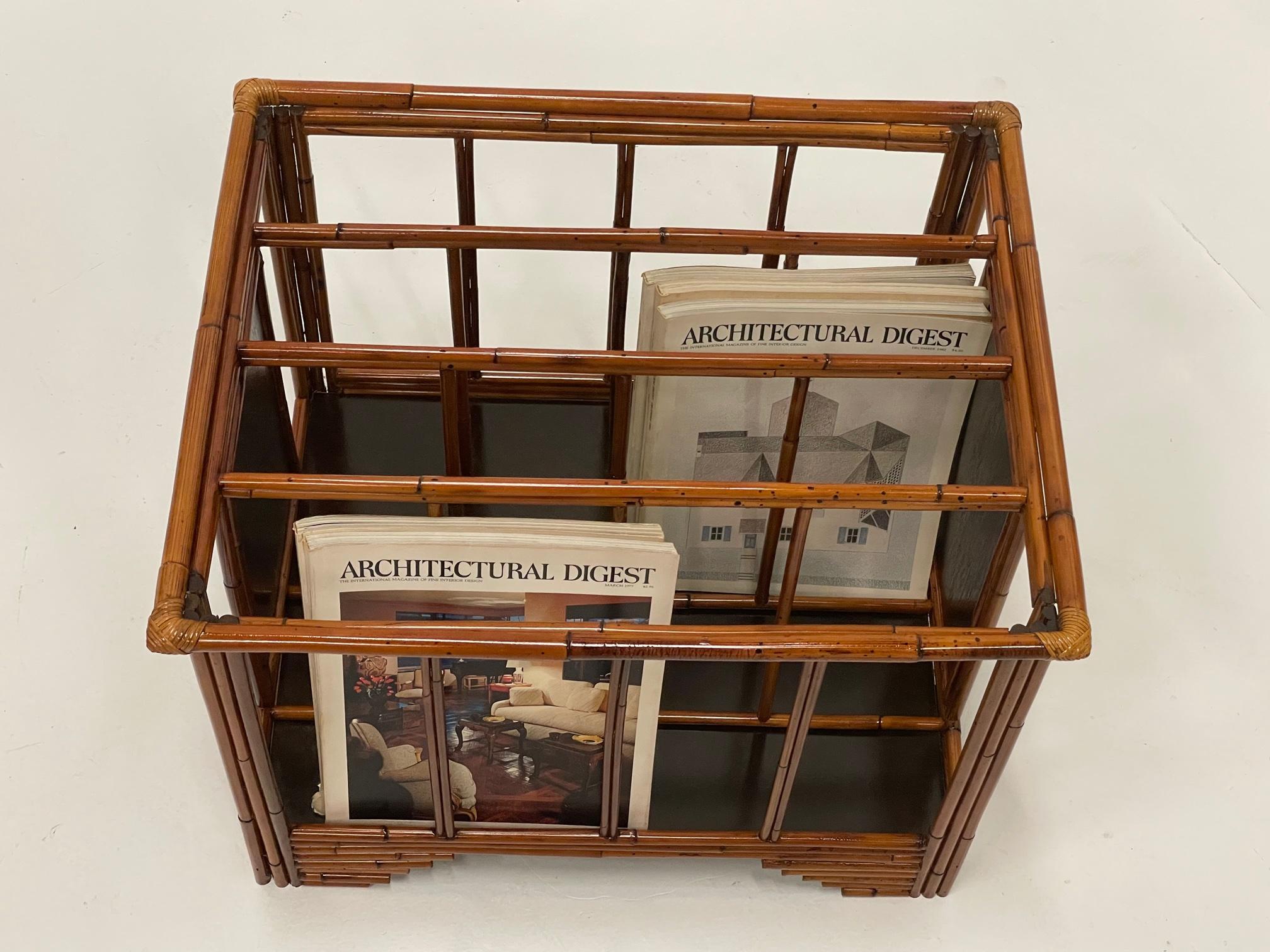 Great looking and functional magazine rack beautifully constructed of bamboo, wicker and stained wood.