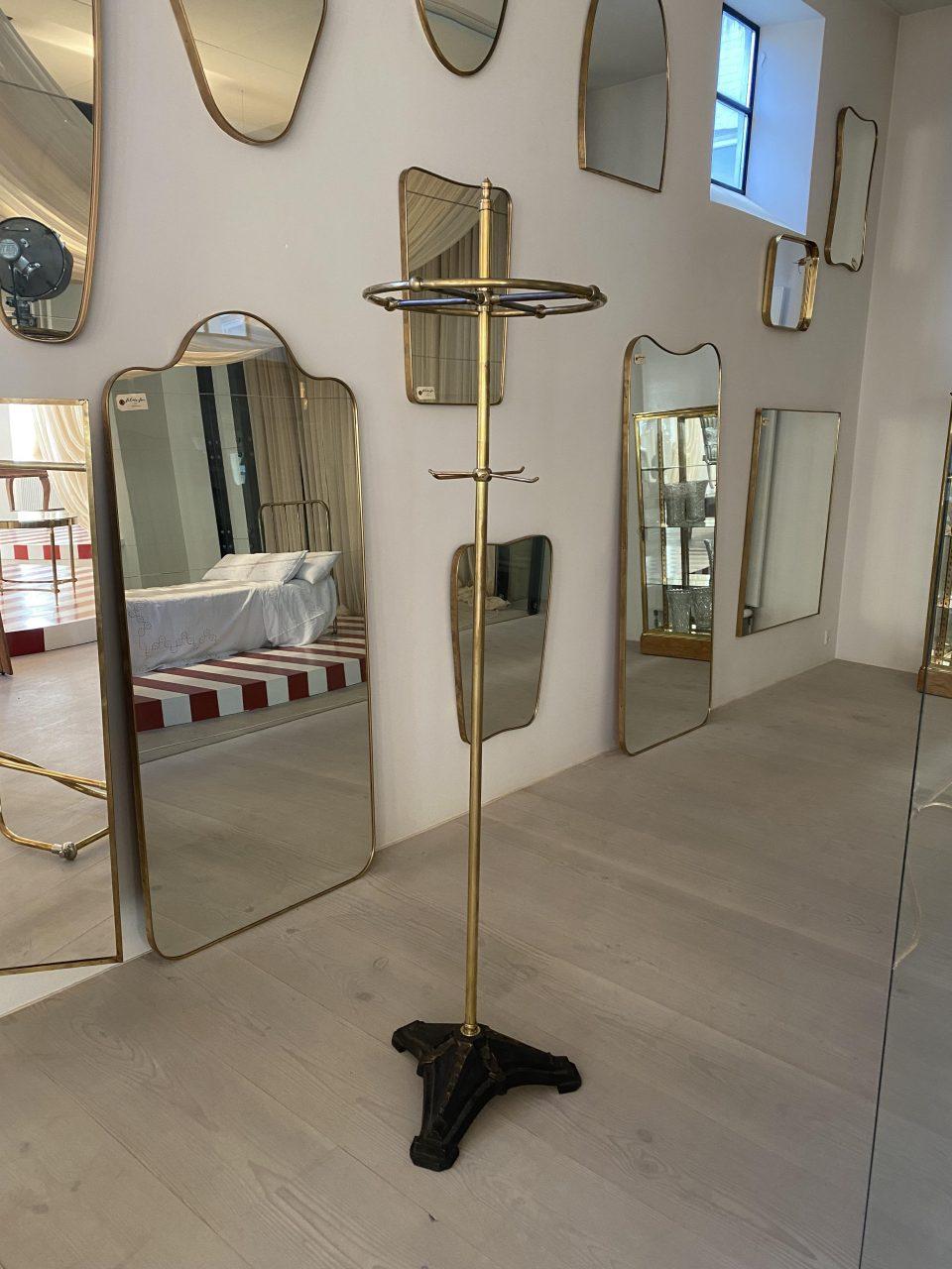 Stately and elegant early 1900s French coat and hat stand, which has a distinctive and sculptural design. A circular wreath at the top provdes space to hang hangers with jackets and coats.

This dumb waiter is a piece of beautifully executed