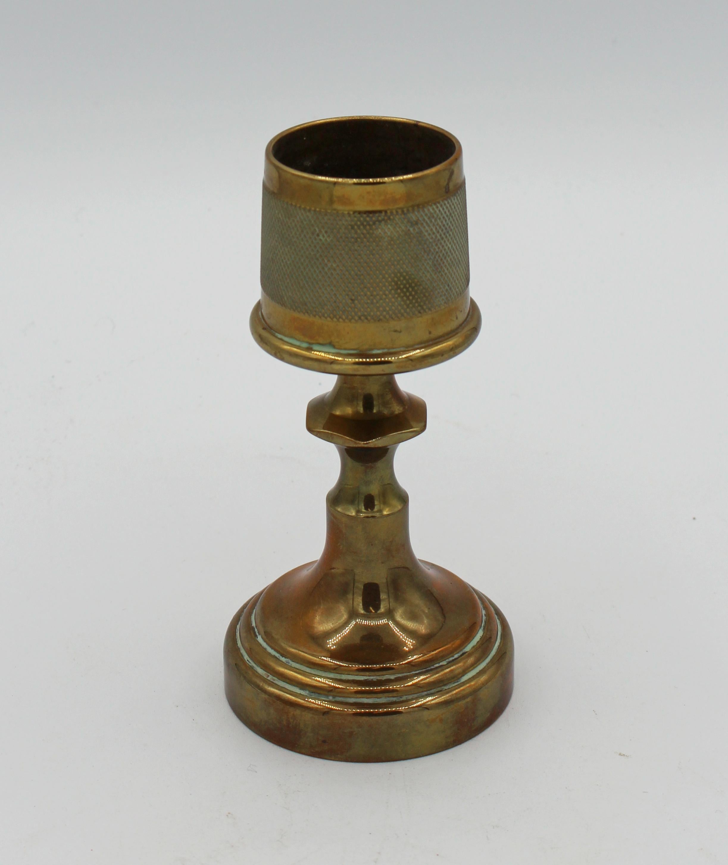 A handsome brass match strike & holder, Edwardian, c. 1900, English. Heavily weighted for stability on a gentleman's desk or in a London gentleman's club. The strike area is worn and no longer functions. 4 7/8