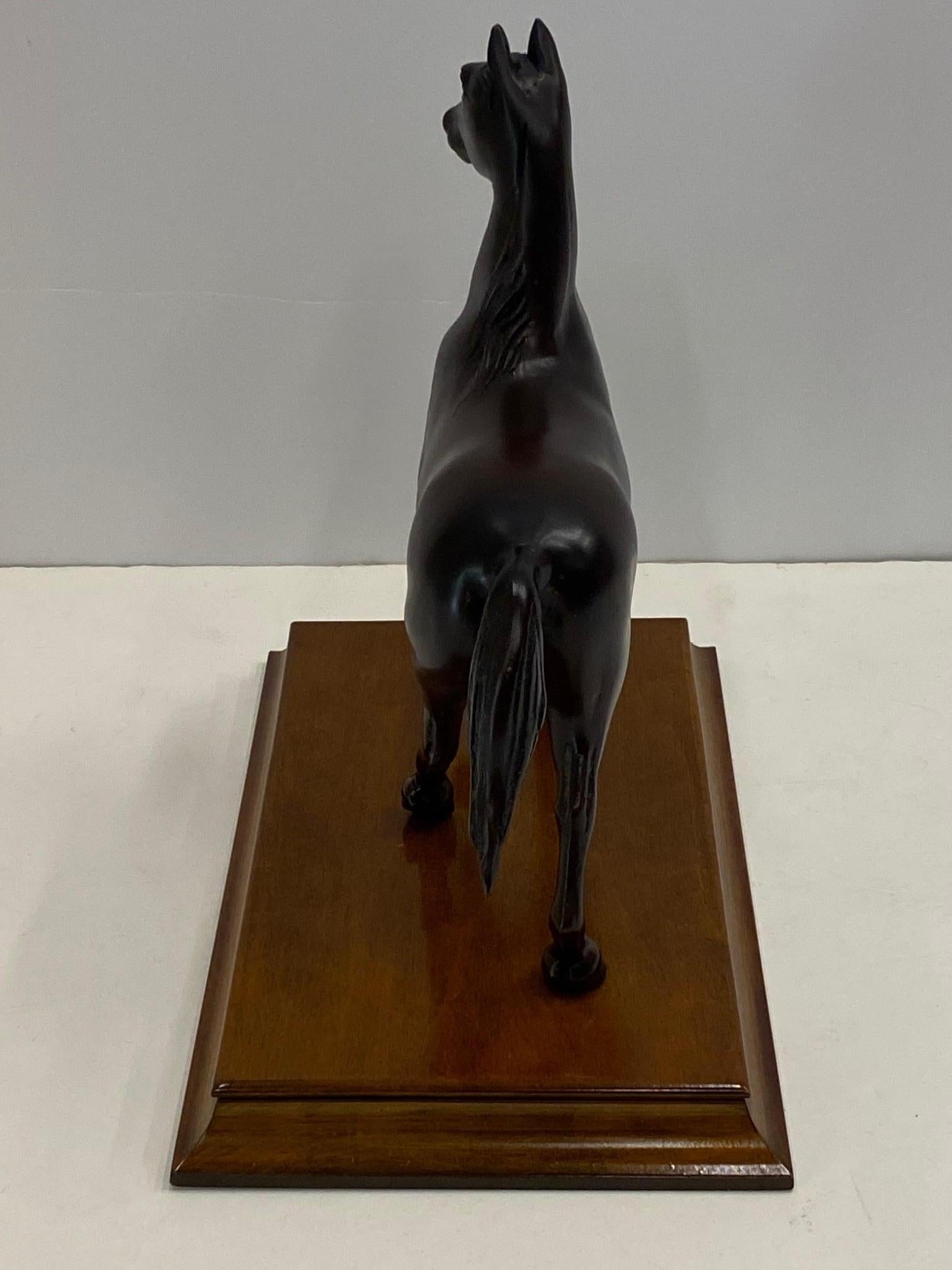 Cast Handsome Bronze Horse on Wooden Base For Sale