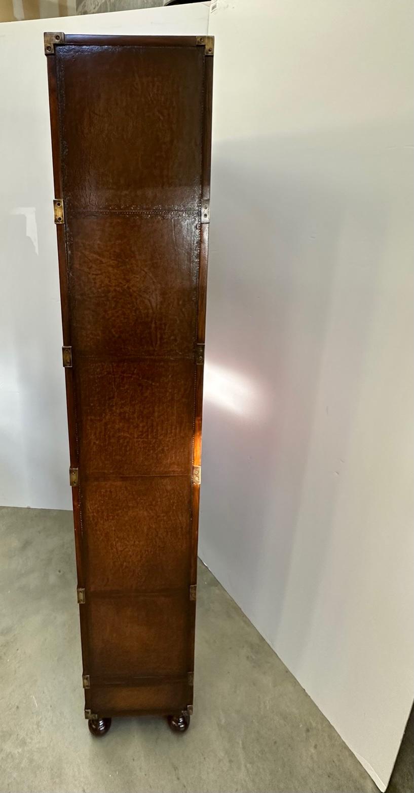 Late 20th Century Handsome Campaign Style Leather Wrapped Bookcase For Sale