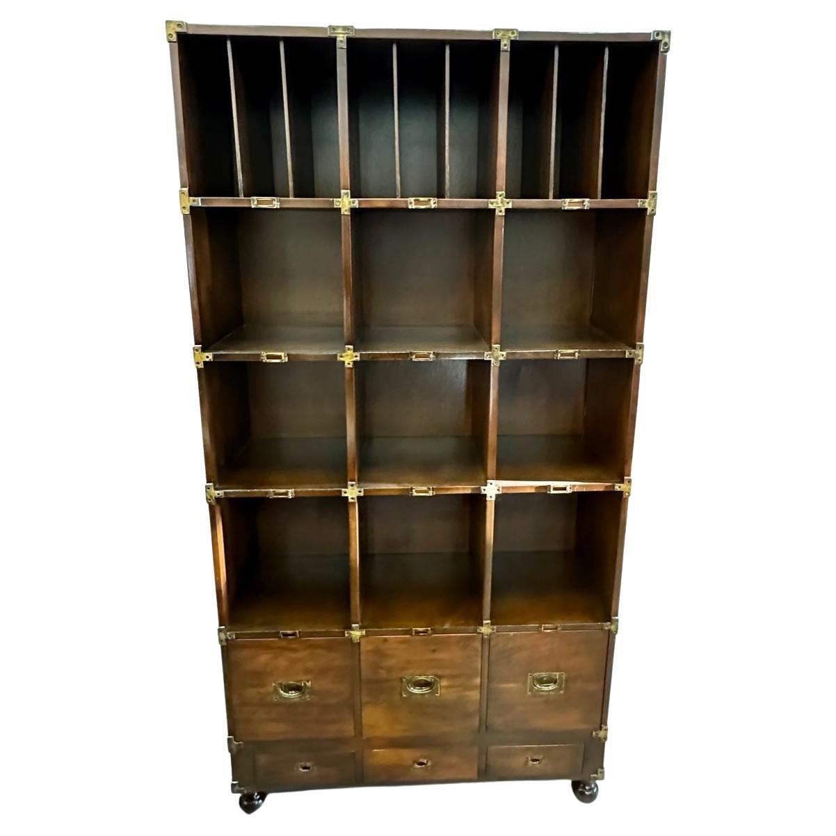 Handsome Campaign Style Leather Wrapped Bookcase For Sale