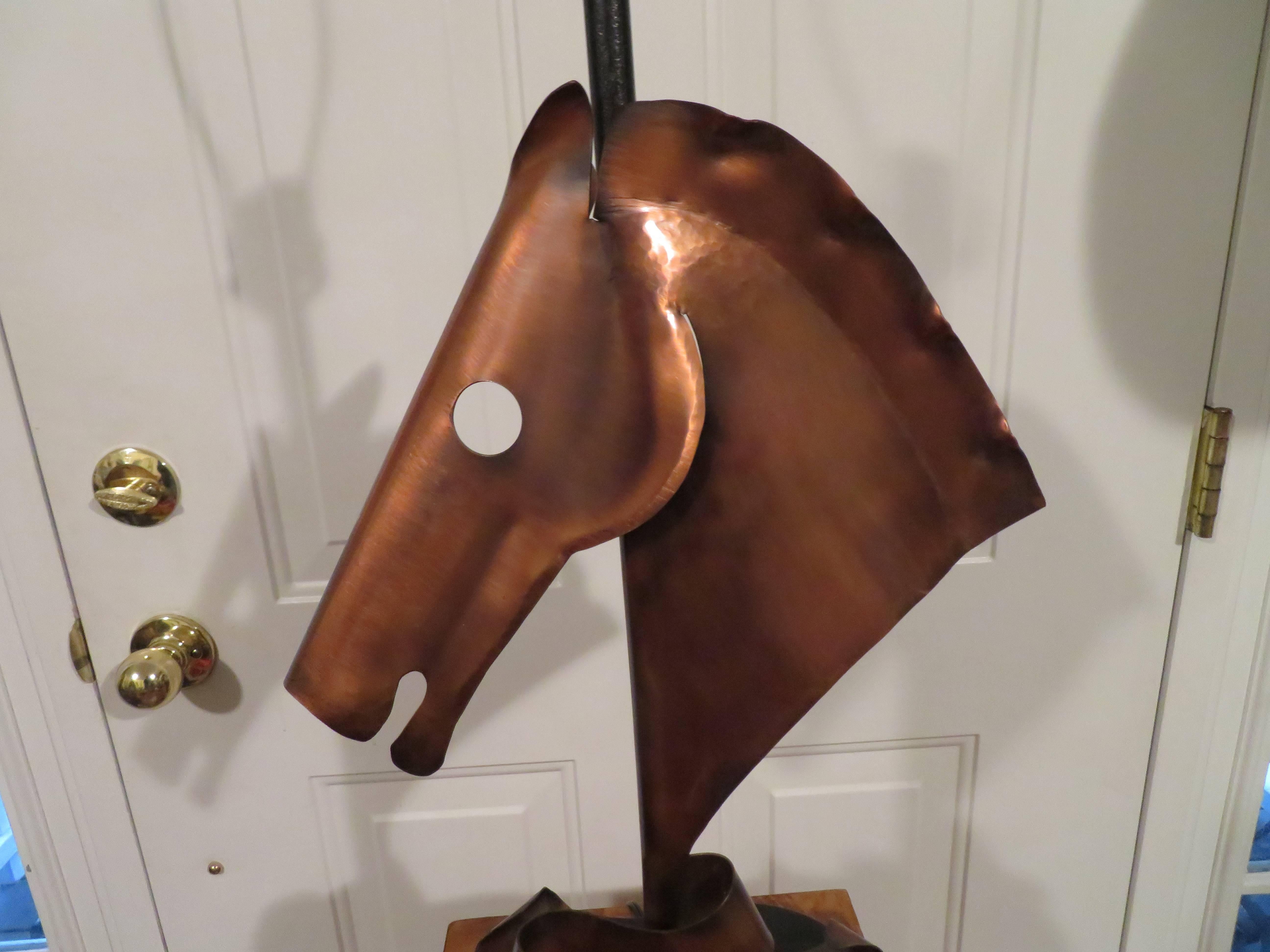 Awesome and rare modernistic copper horse head lamp by Yasha Heifetz. We love this lamp-it is even nicer in person. It is large scale and well executed. The lamp is signed on the back of base and measures 25.5