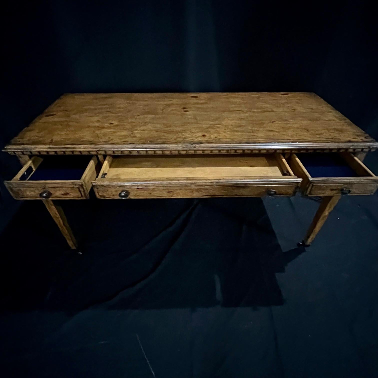 Great size and patina on this vintage Stockton desk by designer Barclay Butera. Beautiful walnut writing desk having 3 drawers where the middle drawer has a dropdown if desired. Rolls on small subtle brass casters seamlessly. #3522
apron 24