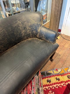 Handsome Distressed Black Leather Diminutive Loveseat