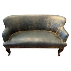 Handsome Distressed Black Leather Diminutive Loveseat