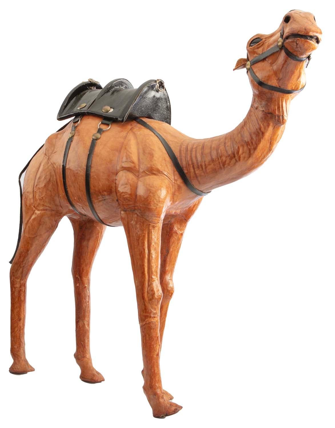 Uniquely handsome leather camel will catch your attention. Best used as novelty decor in a stark white room, like finding a cool ride in the desert! You might not know why, you've just got to have that camel! But,, you do!  Going, going, gone!! 