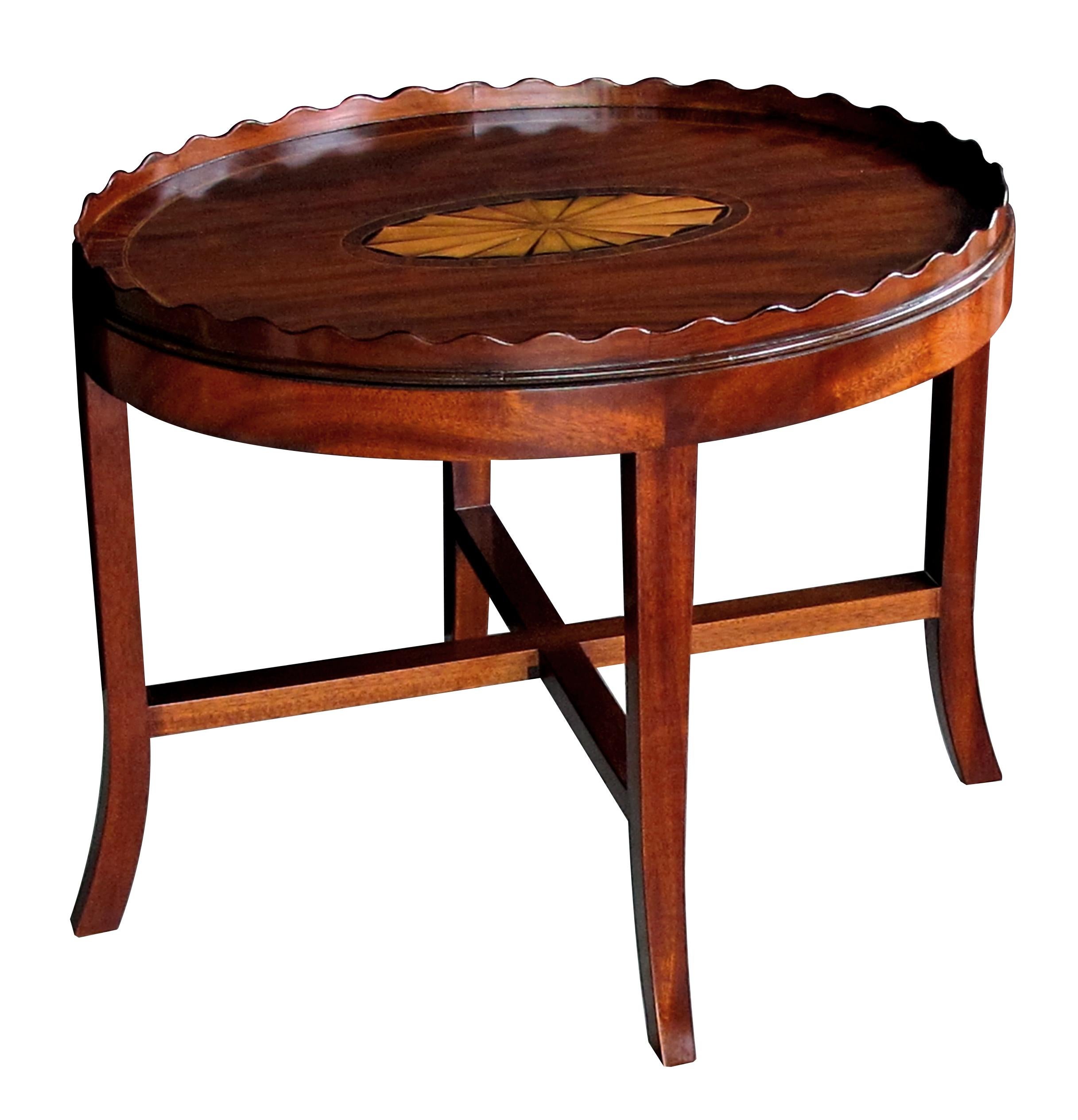 The large mahogany oval tray centering an impressive satinwood shell motif surrounded by rosewood banding; raised on a later stand. (the tray itself measures 24.5