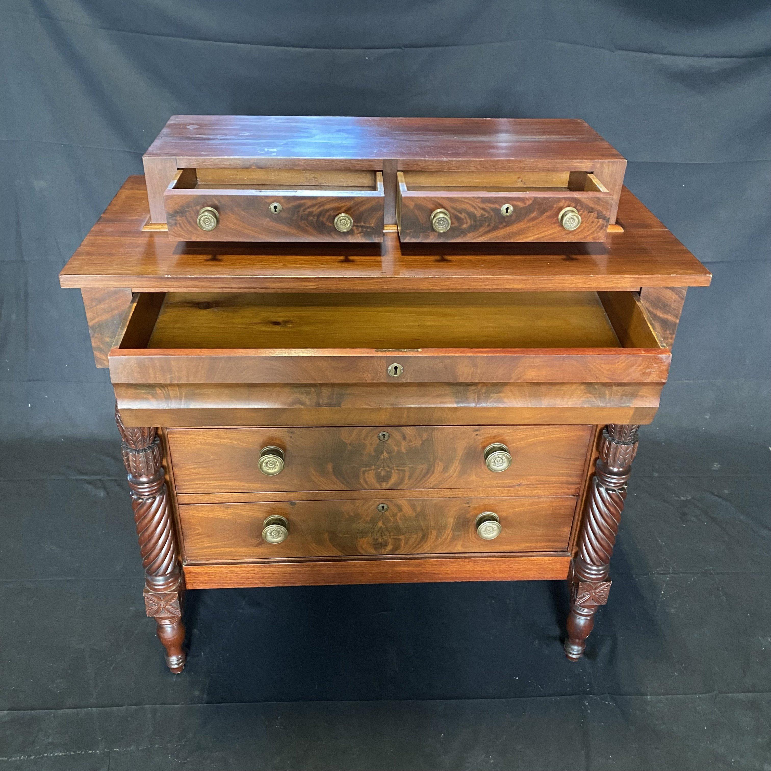 As found in Maine, this lovely Sheraton Federal step back mahogany chest presents two drawers on top with a 